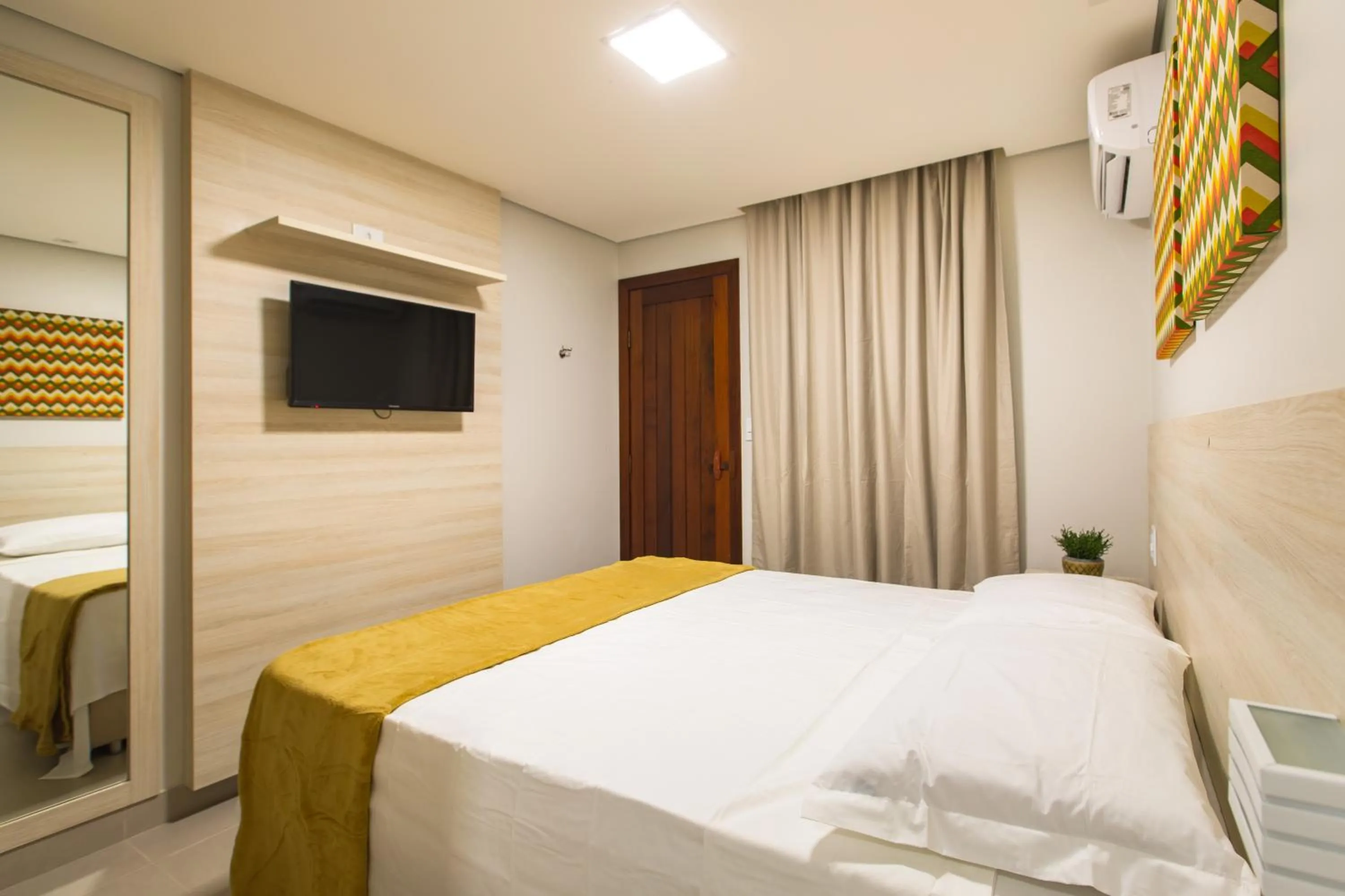 Bed in Hotel Encantos de Itaperapuã