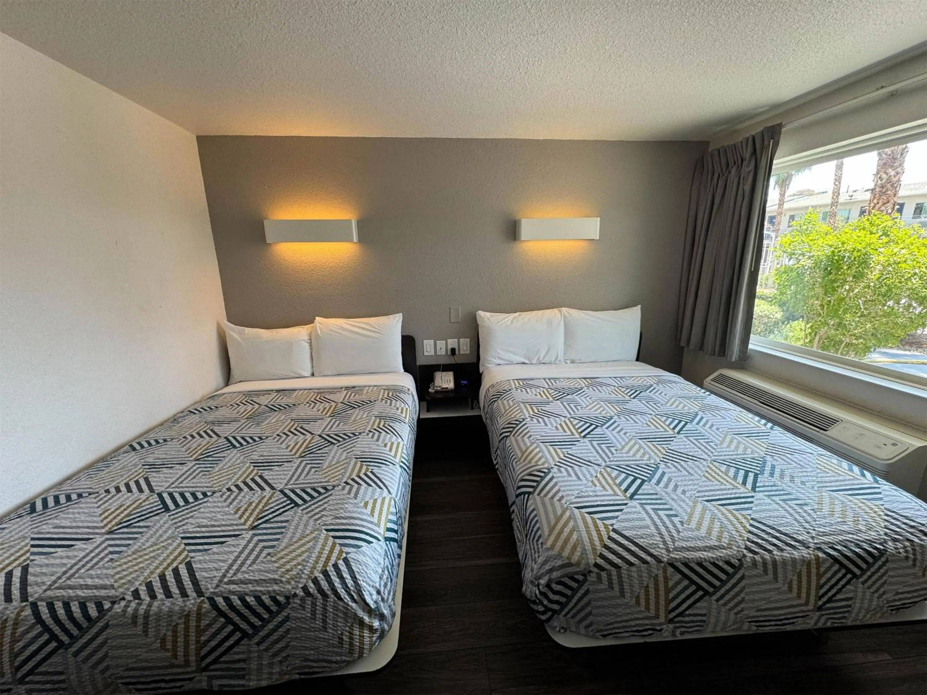 Photo of the whole room, Bed in Studio 6 Suites Las Vegas, NV - Tropicana