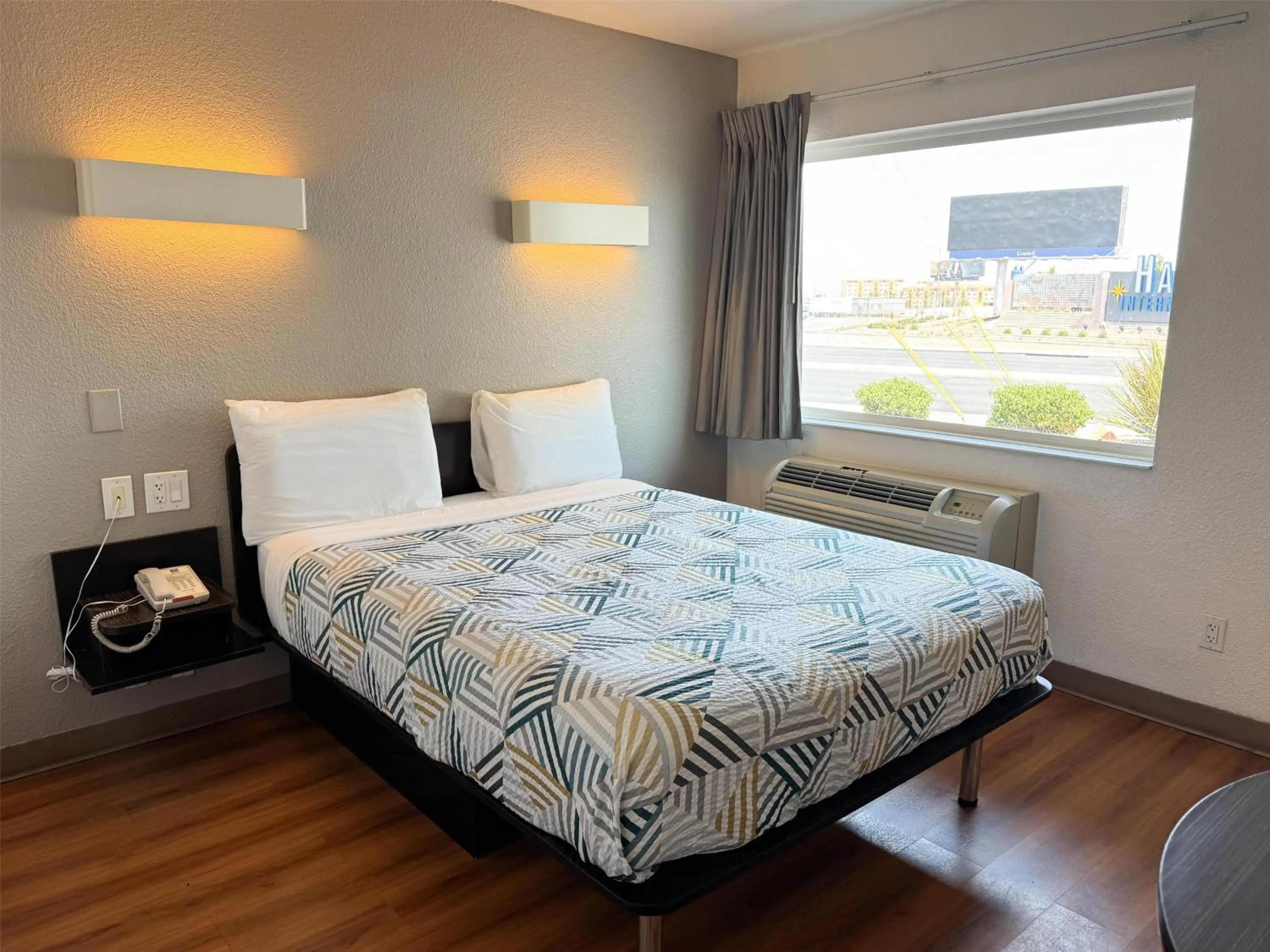 Photo of the whole room, Bed in Studio 6 Suites Las Vegas, NV - Tropicana