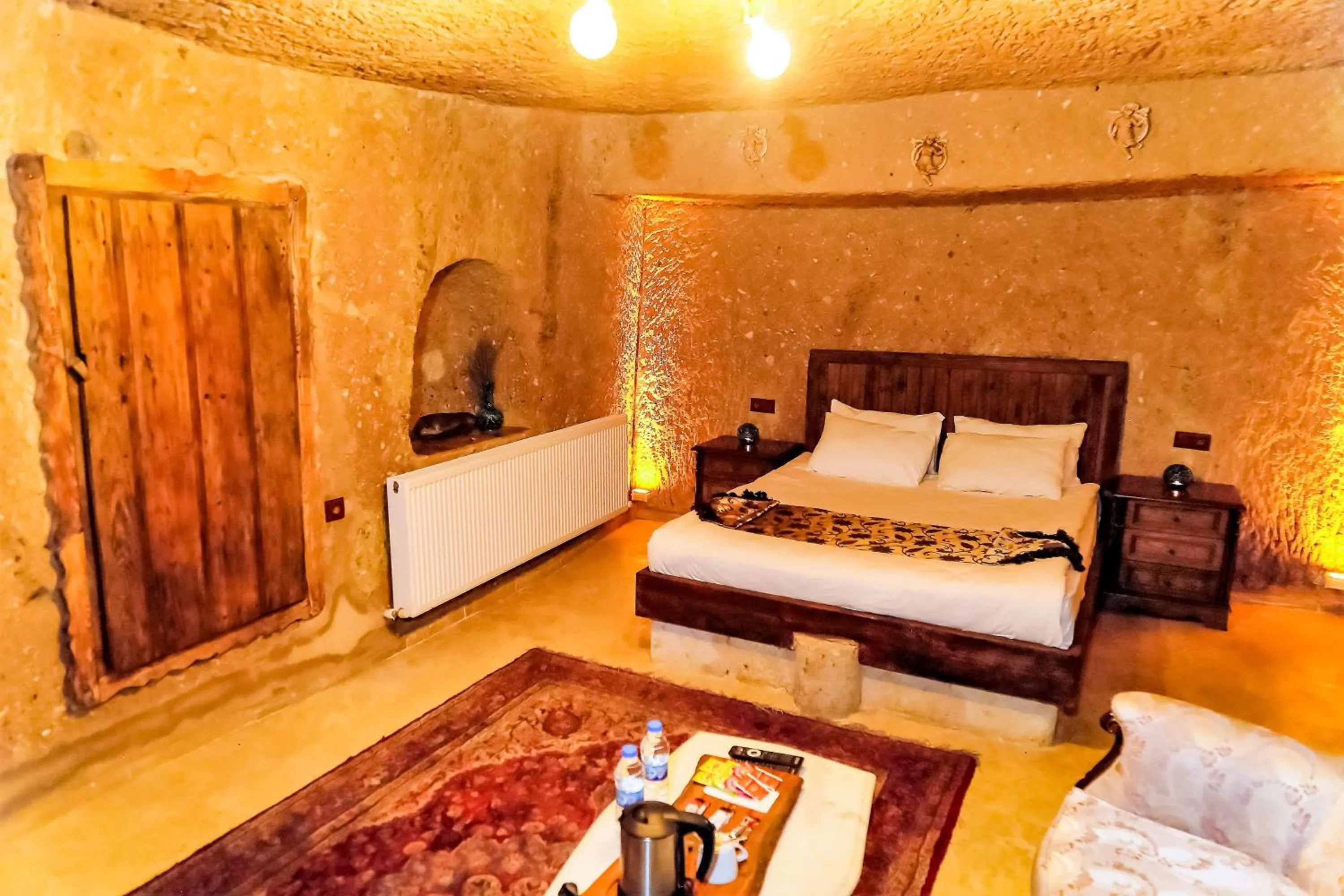 Bed in Larissa Cave Hotel