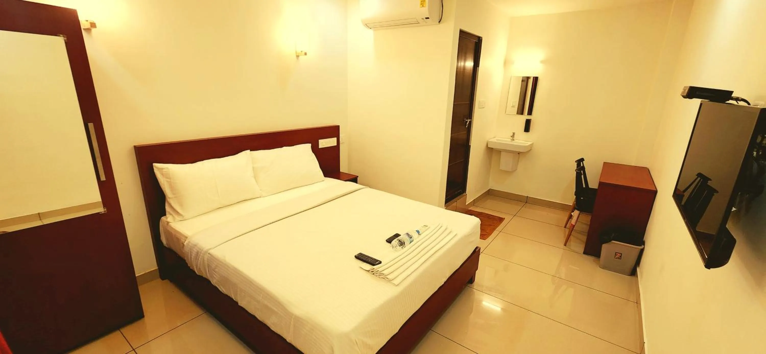 Bed in Apsara Residency