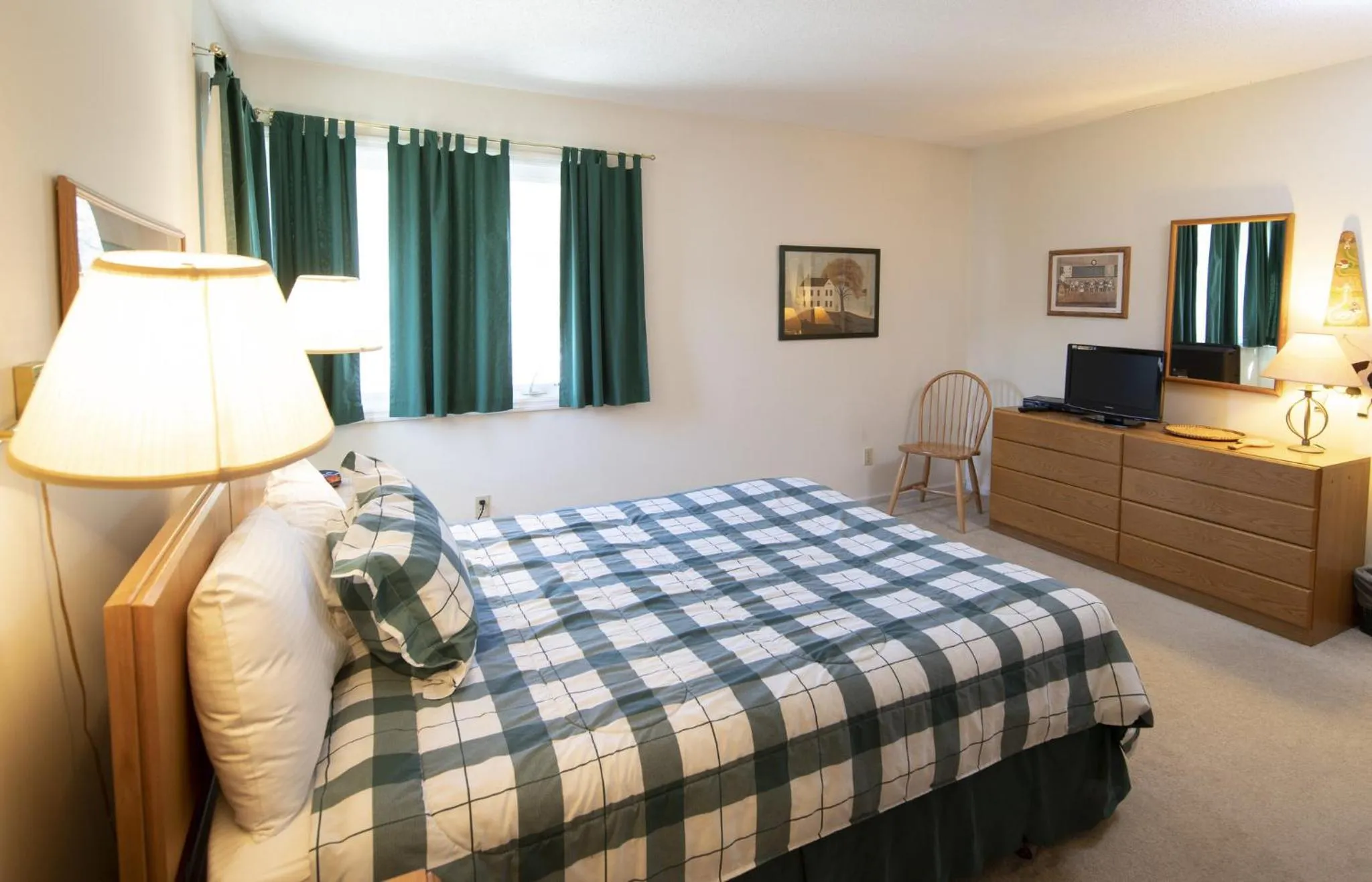 Photo of the whole room, Bed in Okemo Mountain Lodging by Vail Resorts