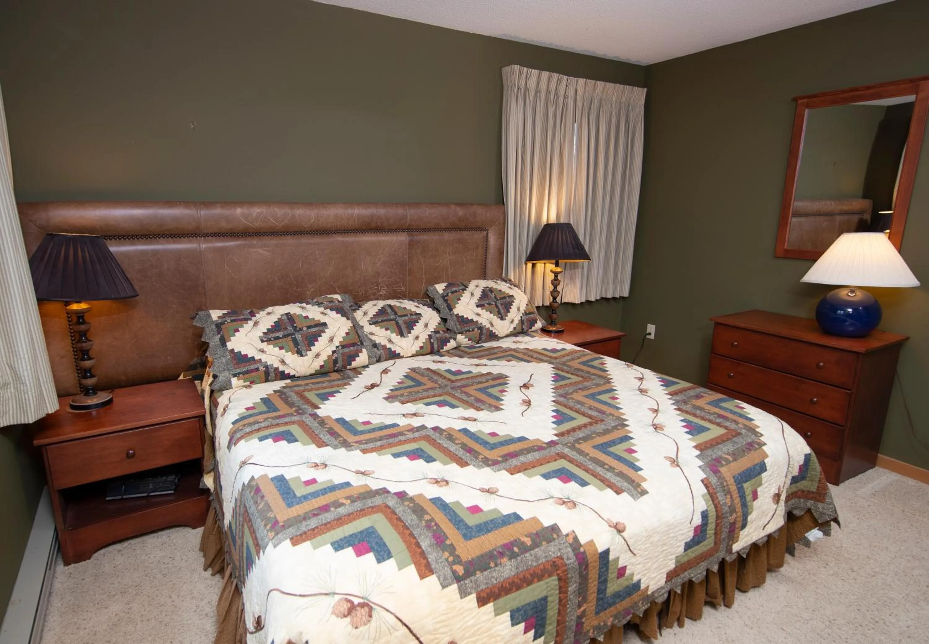 Bed in Okemo Mountain Lodging by Vail Resorts