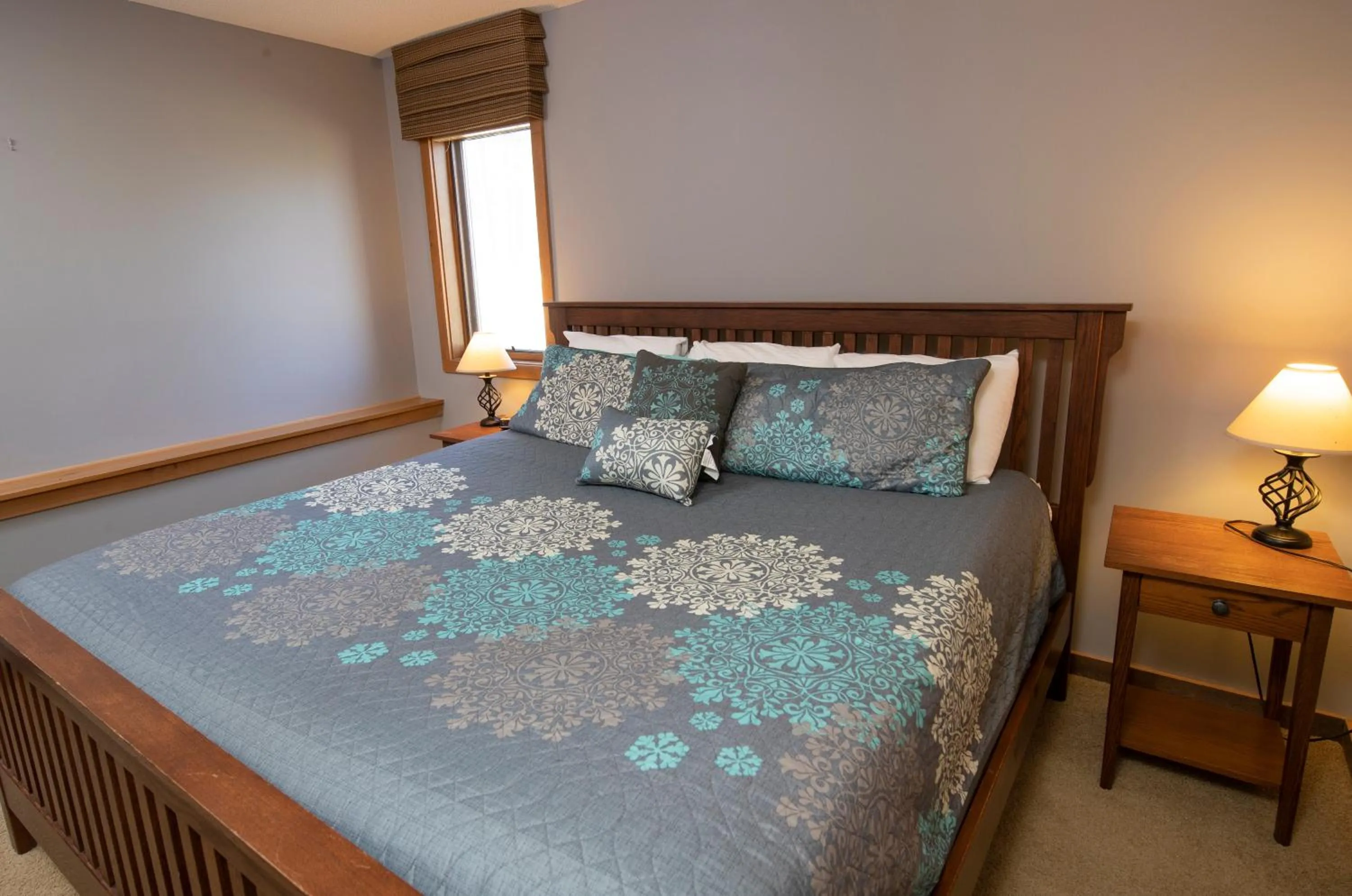 Bed in Okemo Mountain Lodging by Vail Resorts