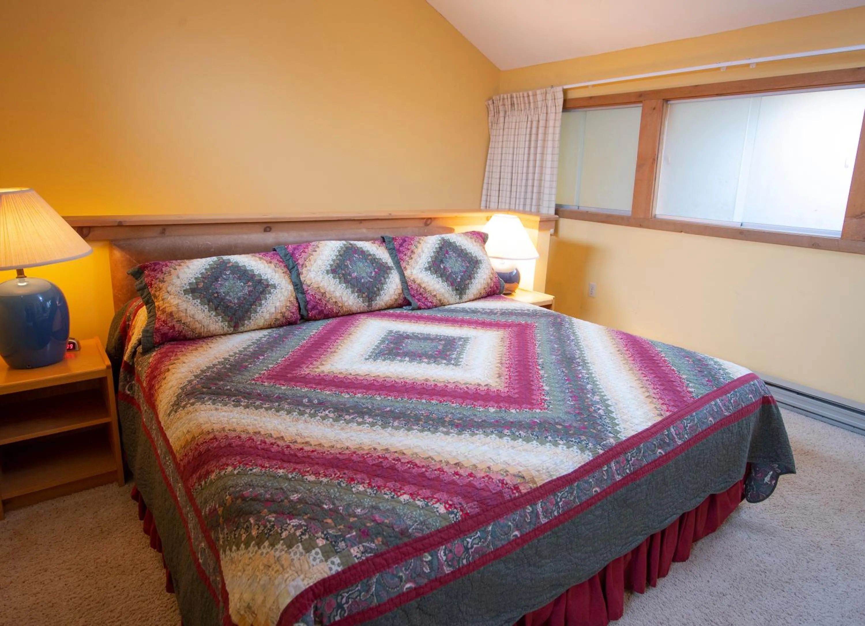 Bed in Okemo Mountain Lodging by Vail Resorts