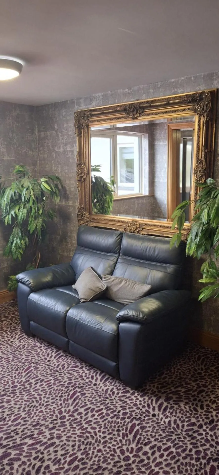 Seating area in Royal Court Hotel