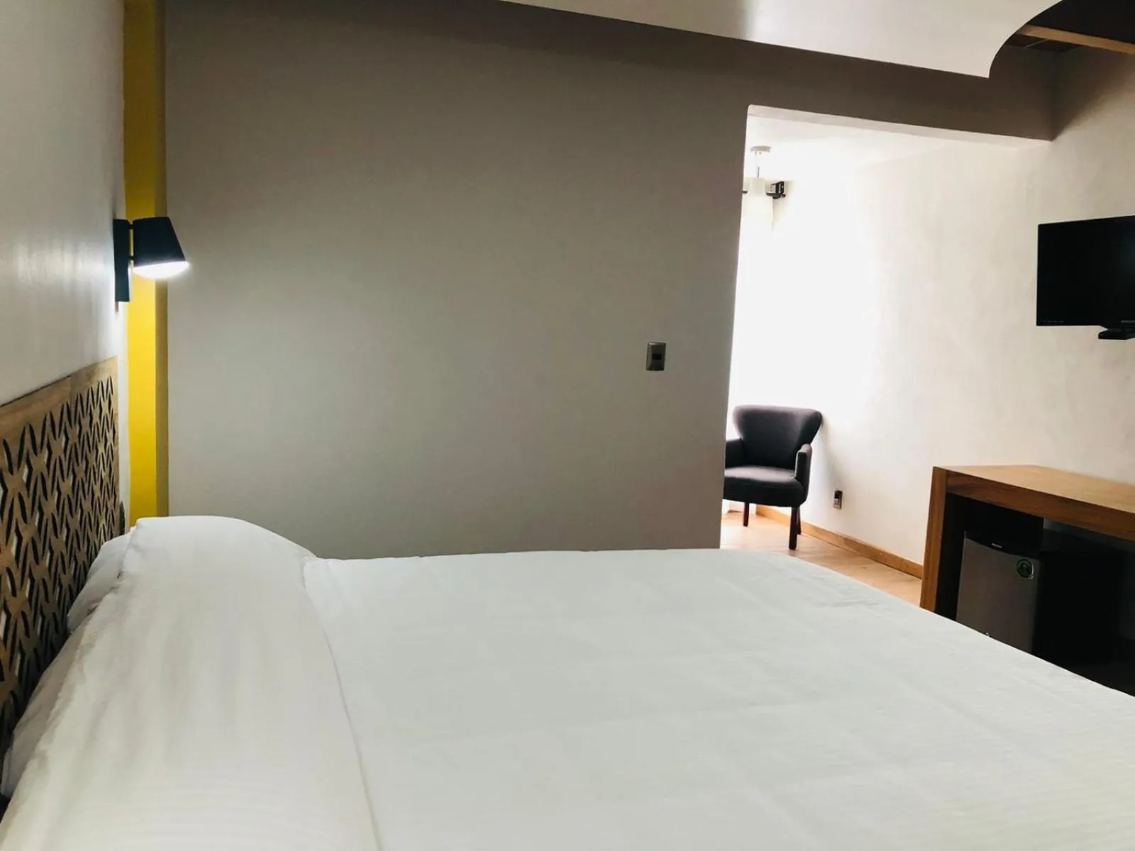 Bed in Hotel La Mansión