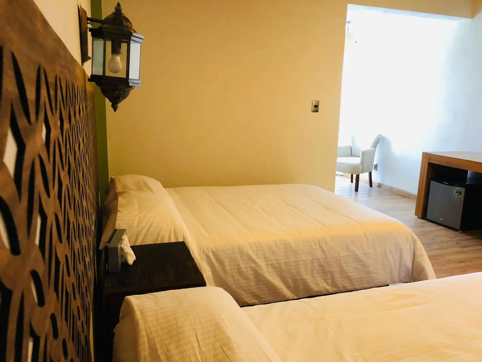 Bed in Hotel La Mansión