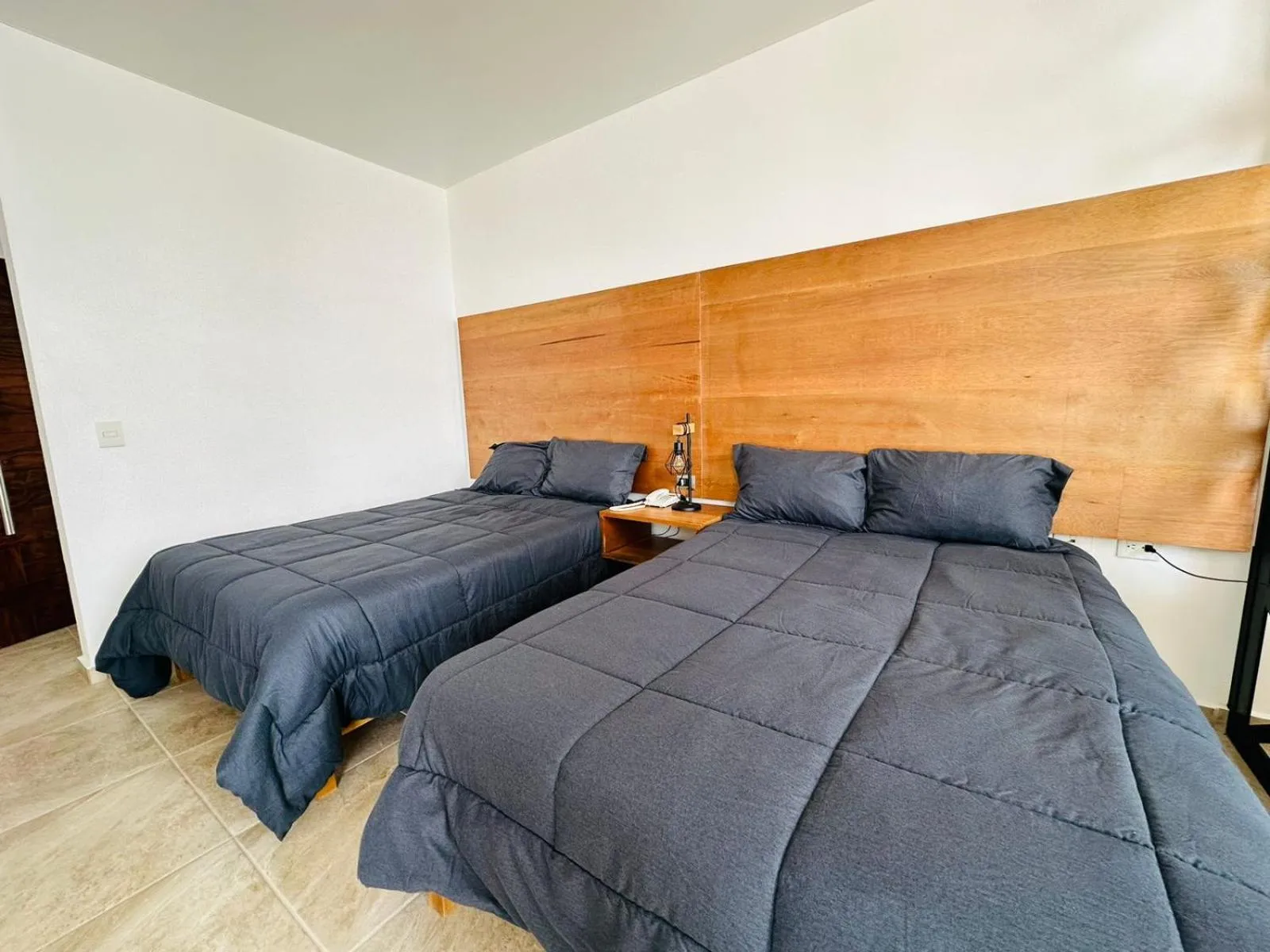 Bed in Hotel La Mansión