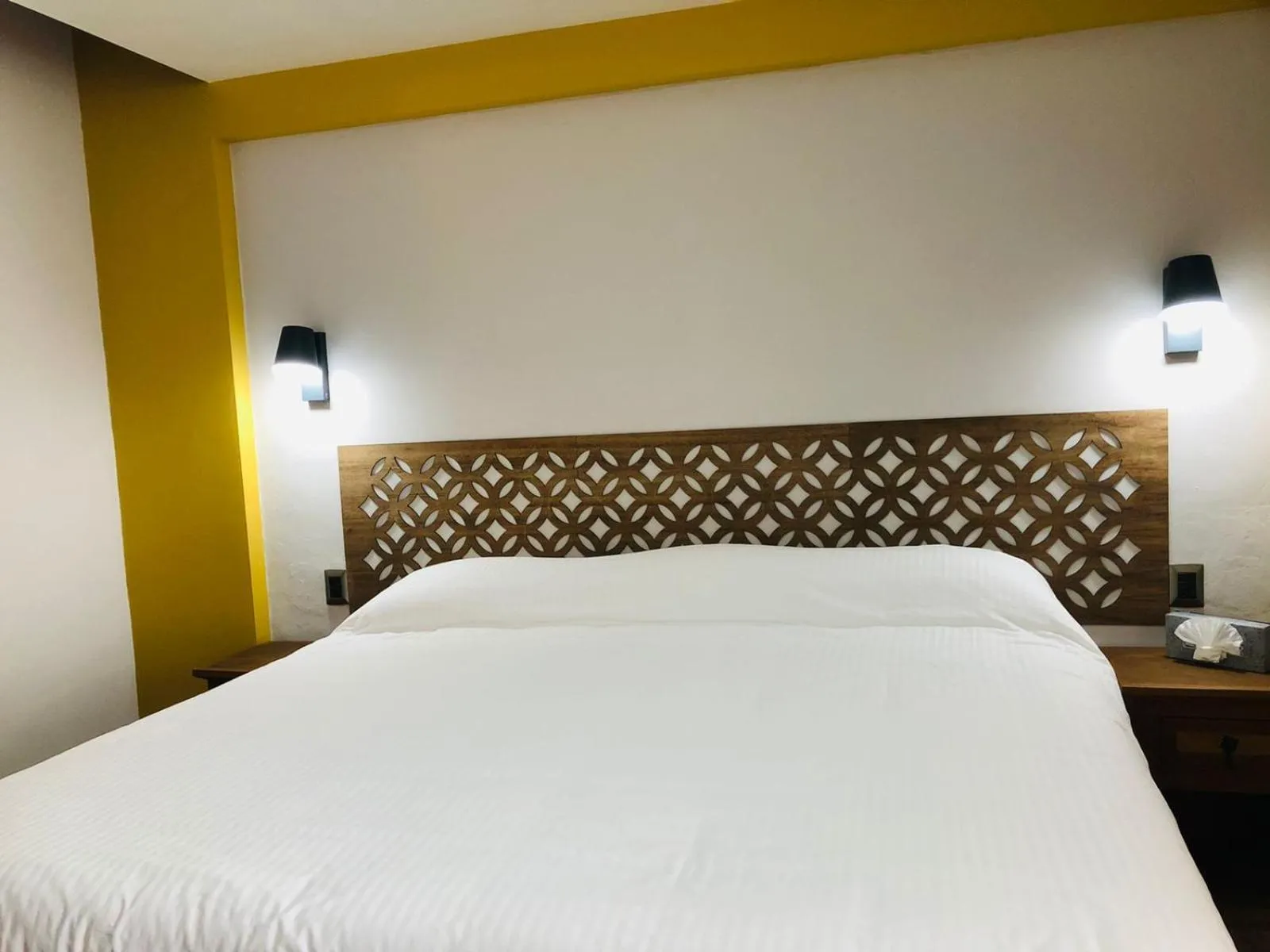 Bed in Hotel La Mansión