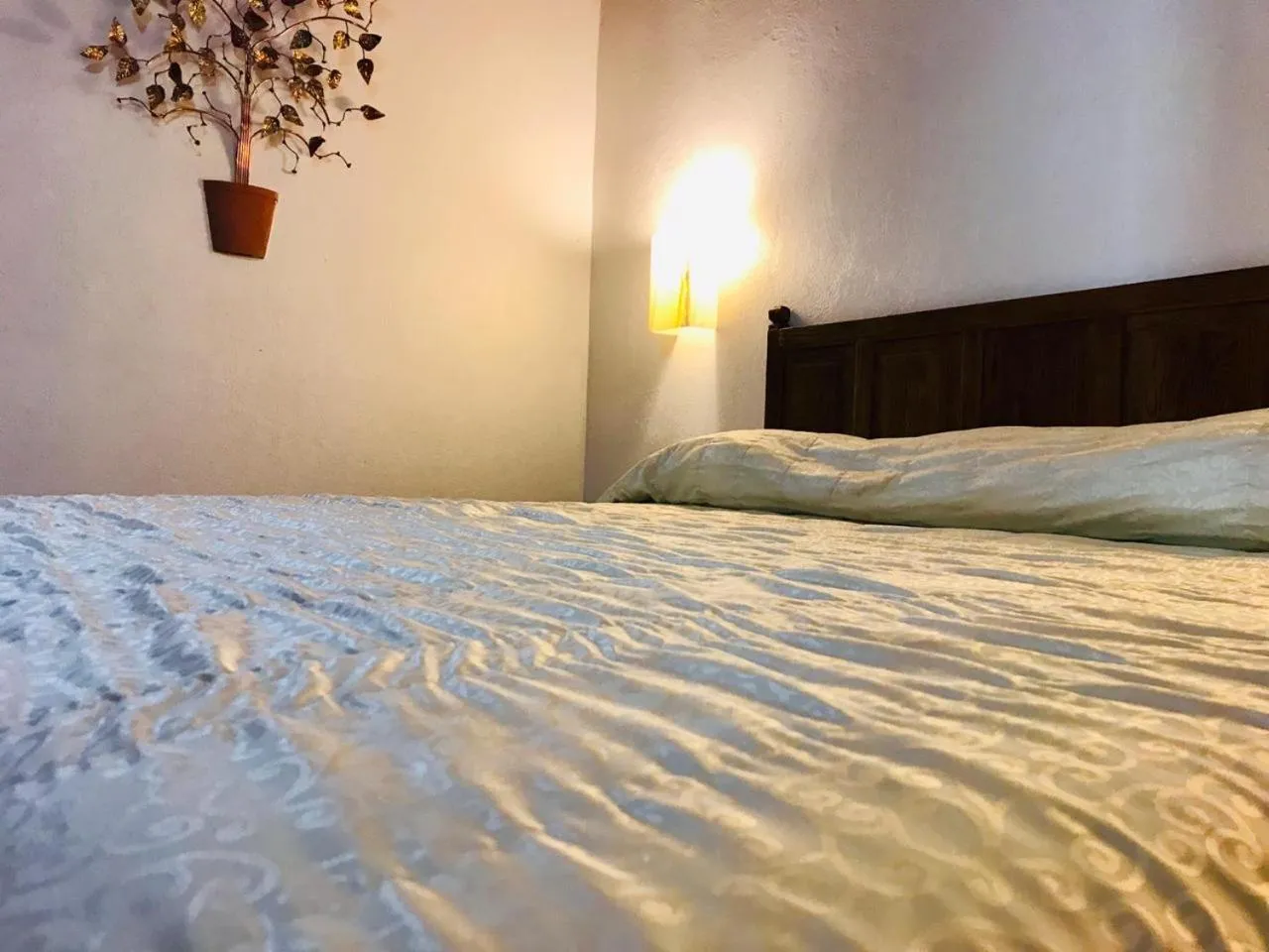 Bed in Hotel La Mansión