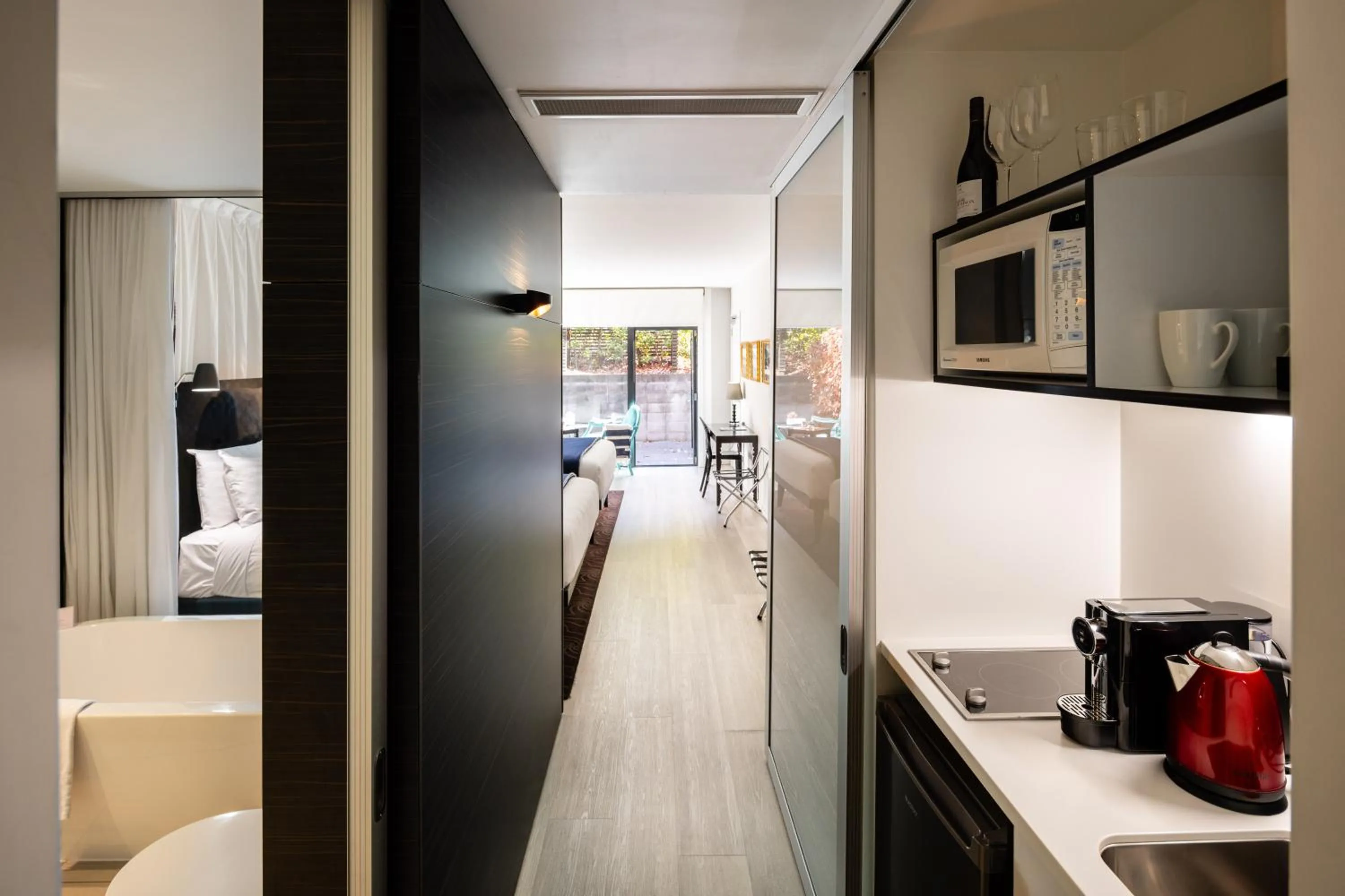 Kitchen or kitchenette in Queenstown Park Boutique Hotel