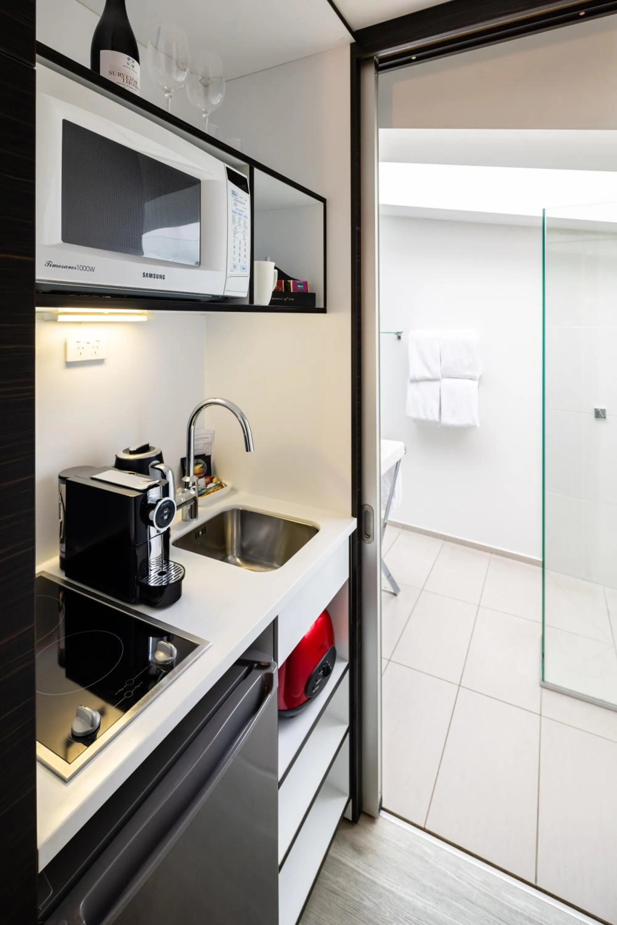 Kitchen or kitchenette in Queenstown Park Boutique Hotel