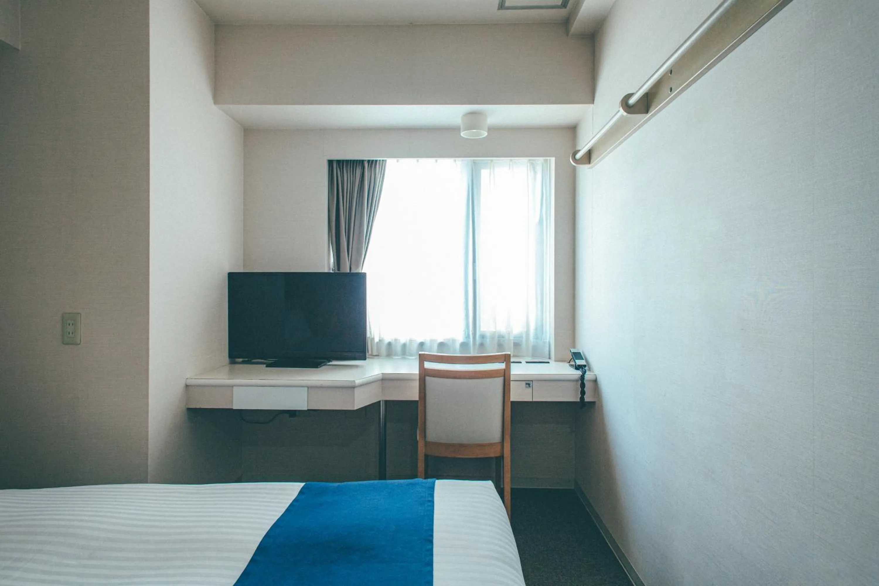 Bed in Hamilton Hotel Blue