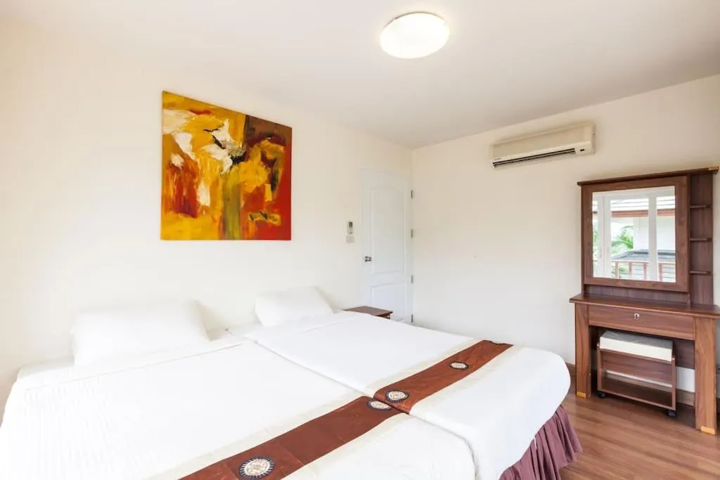 Bed in Baan Talay Samran 4 Bedrooms Villa with Beach and 3 pools