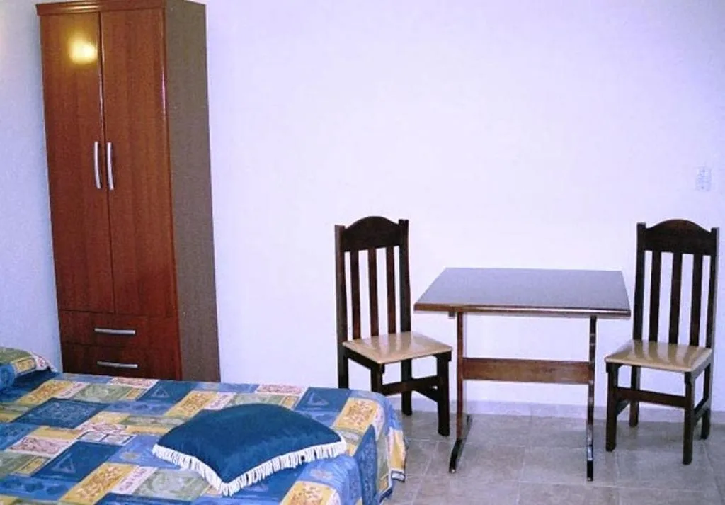 Seating area, Bed in Hotel Portal de Barequeçaba