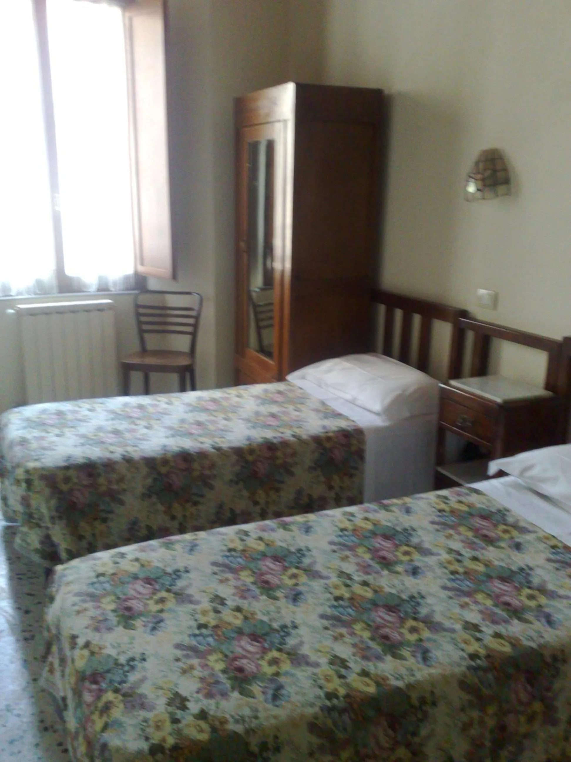 Bed in Albergo Locanda Garibaldi
