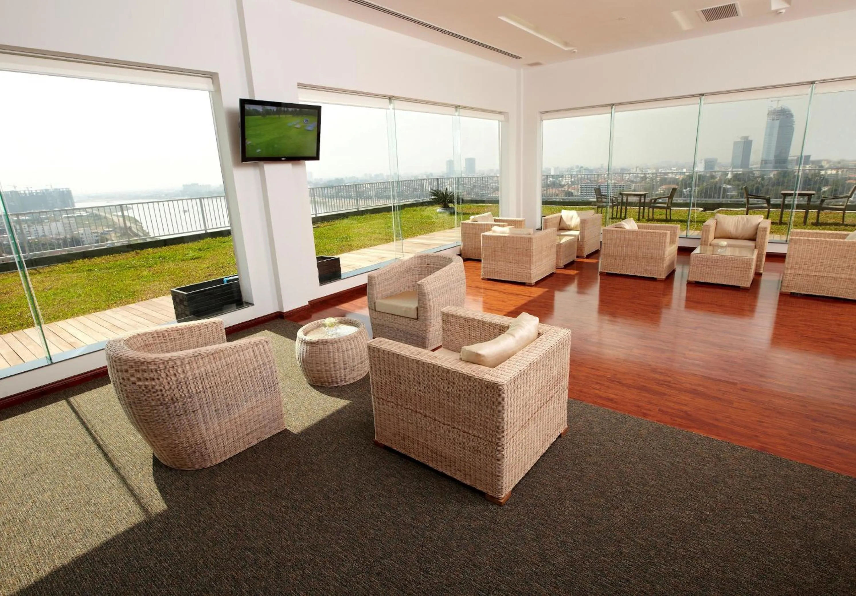 Communal lounge/ TV room in Bellevue Serviced Apartments