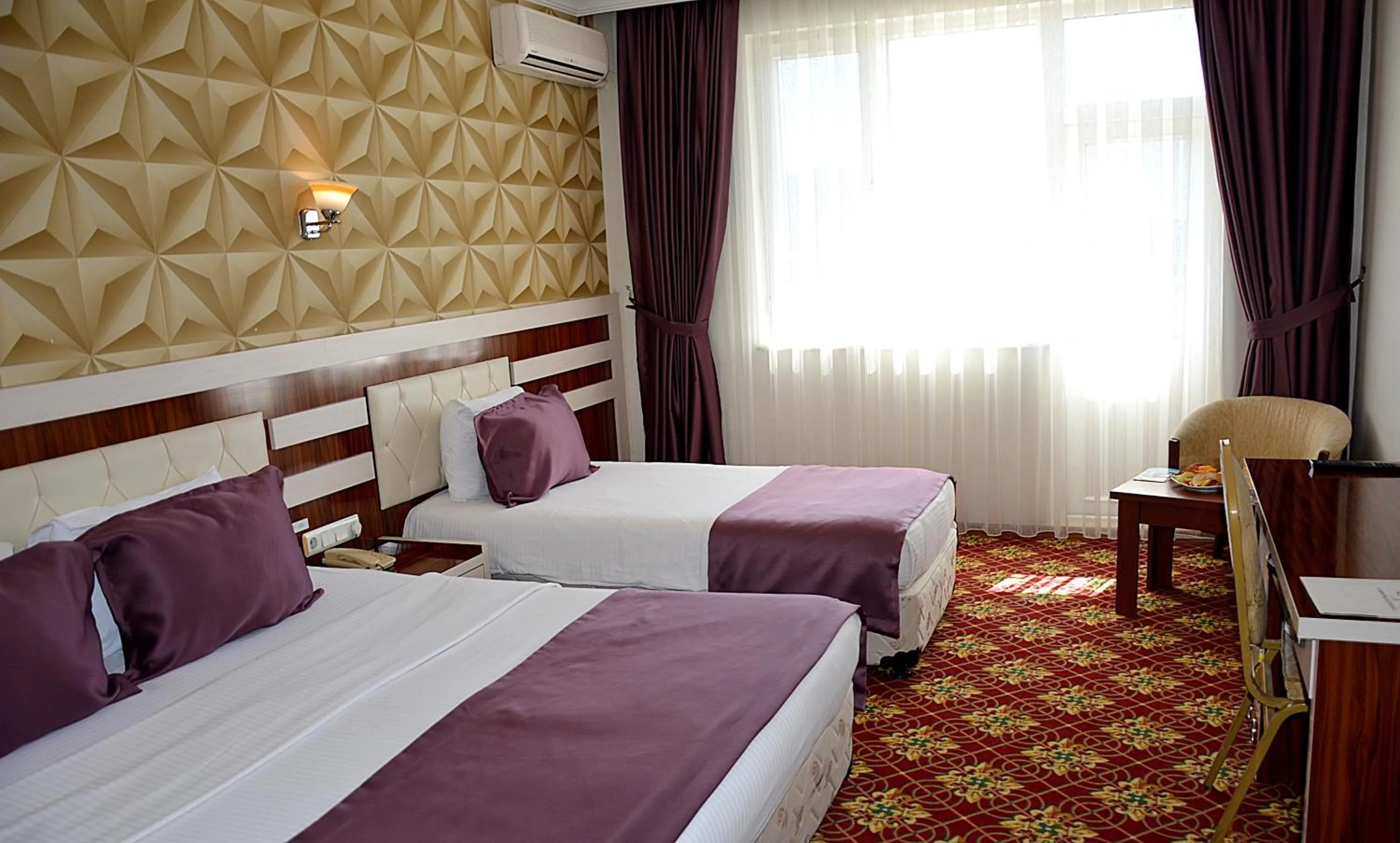 Bed in GARDEN KALE THERMAL HOTEL