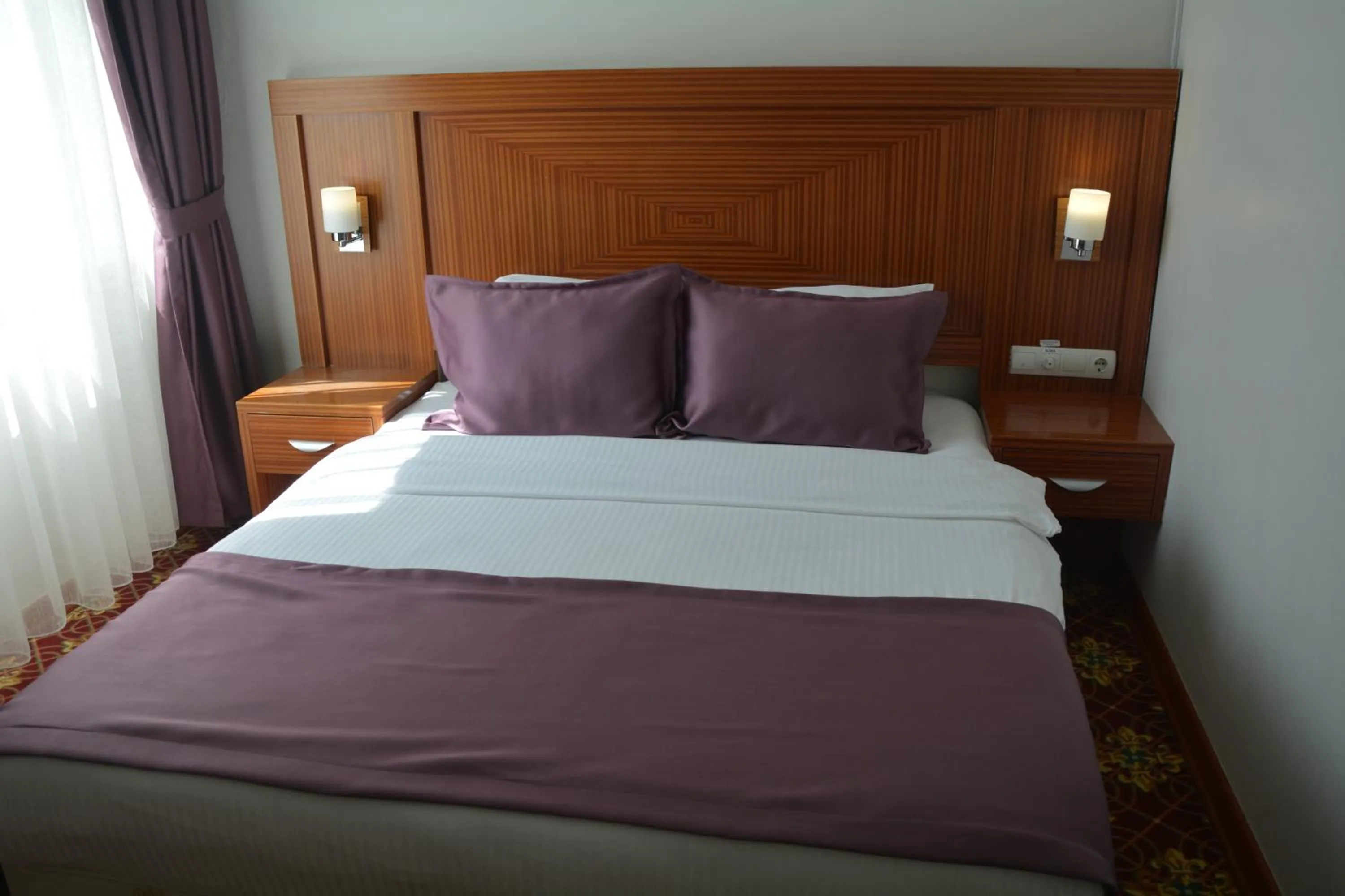 Bed in GARDEN KALE THERMAL HOTEL