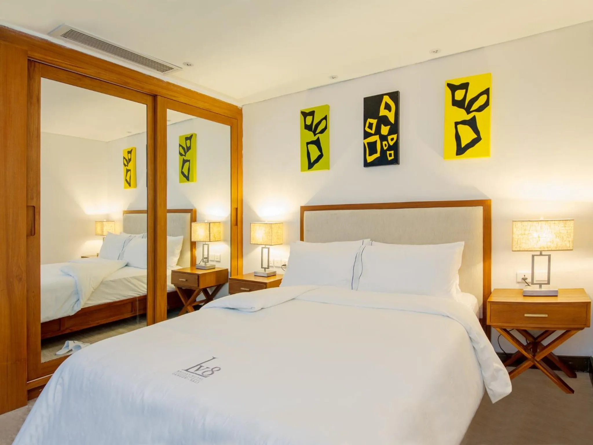 Bed in Lv8 Resort Hotel