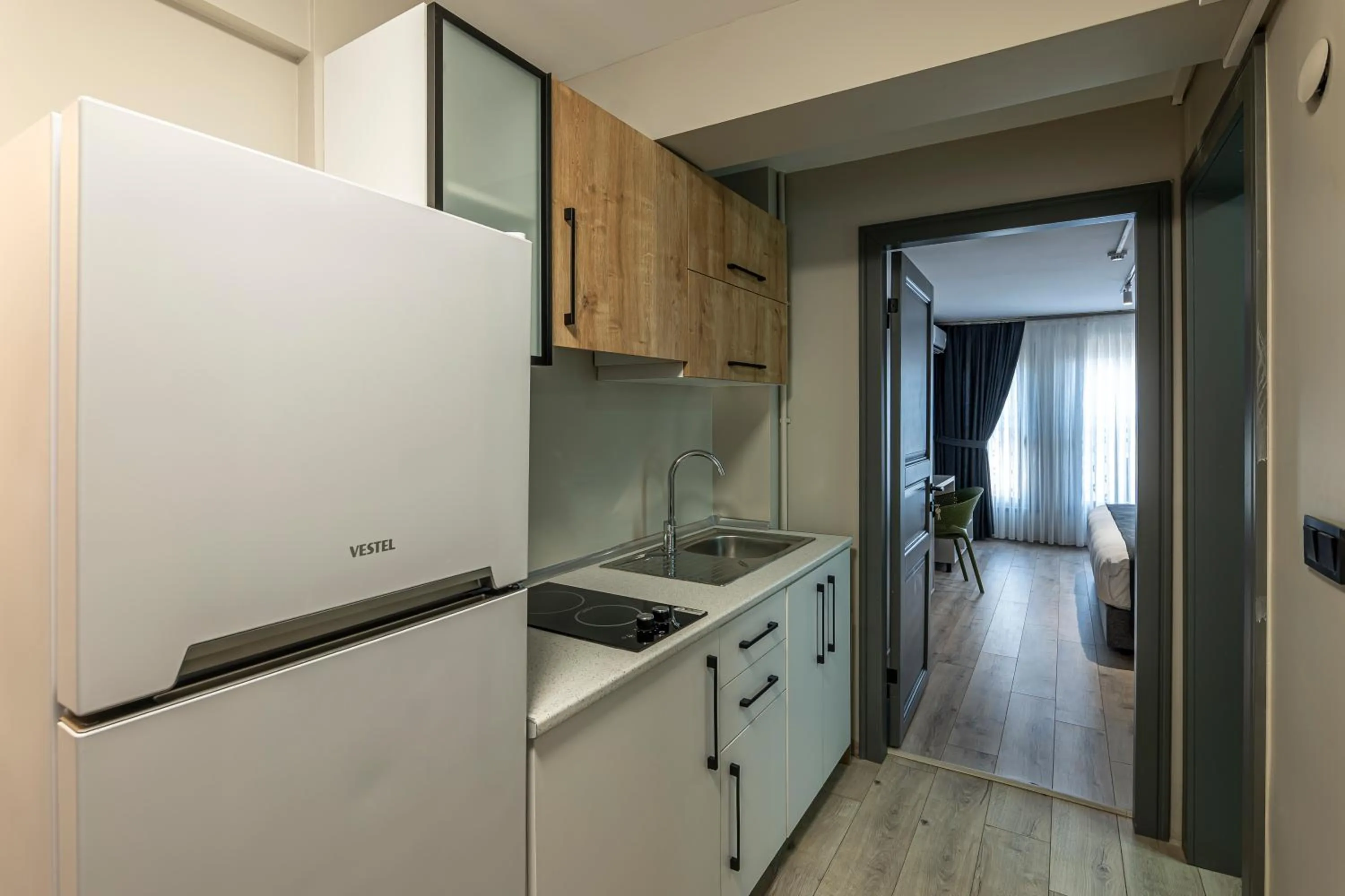 Kitchen or kitchenette in Calanthe Residence