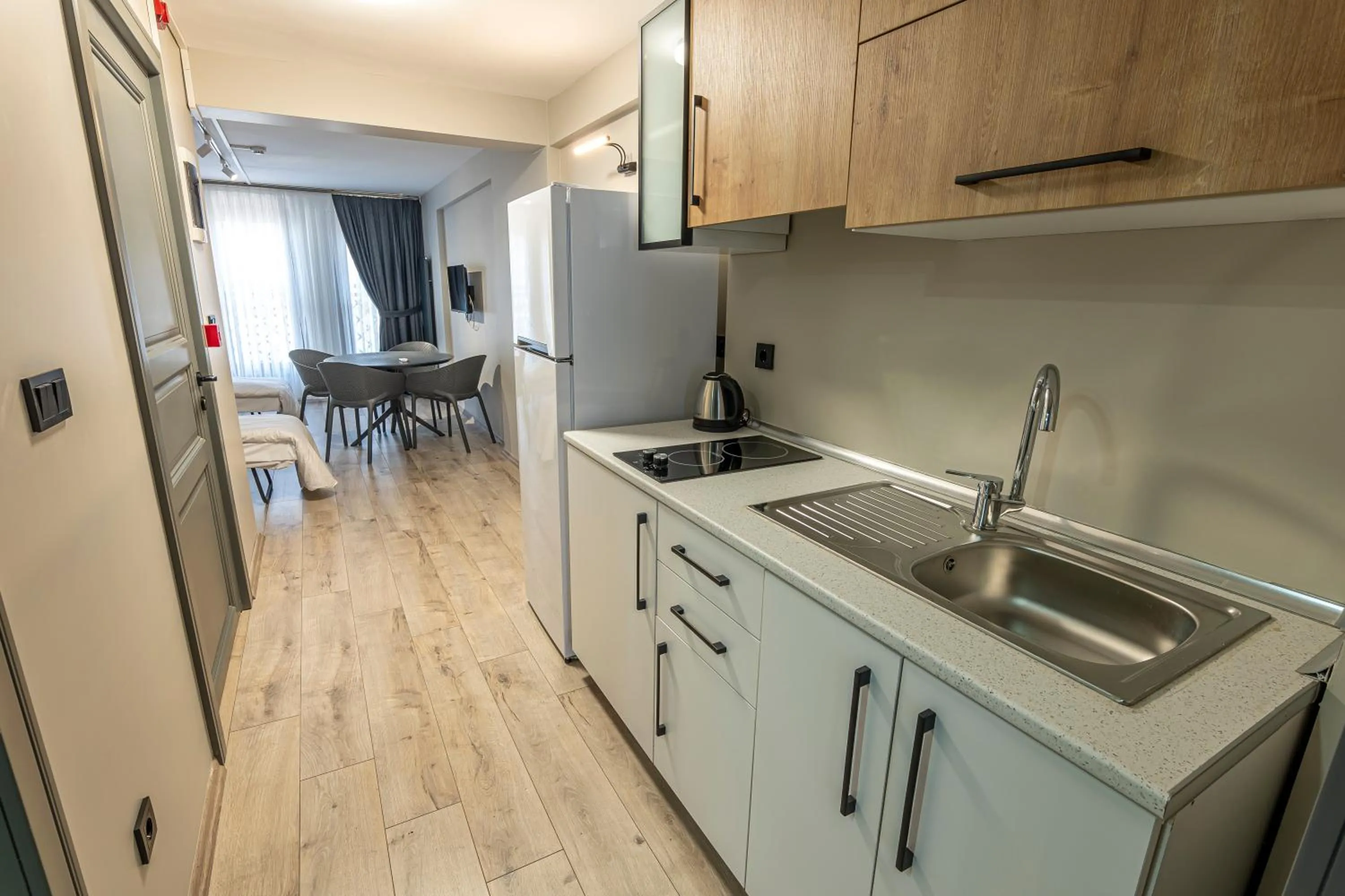 Kitchen or kitchenette in Calanthe Residence