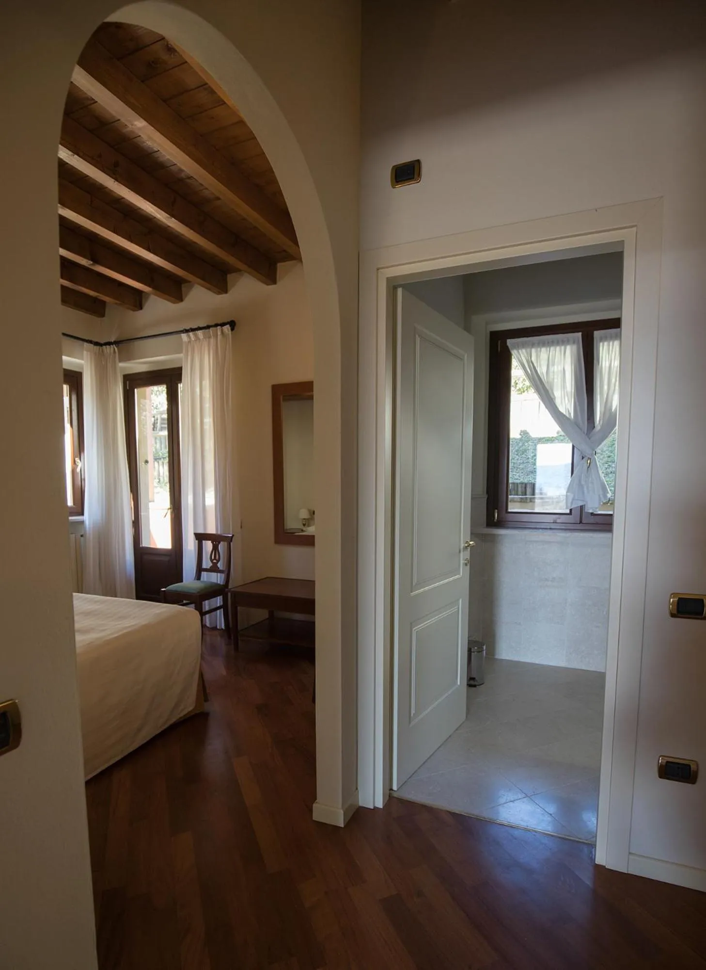 Bed in Apartments Golf Bogliaco