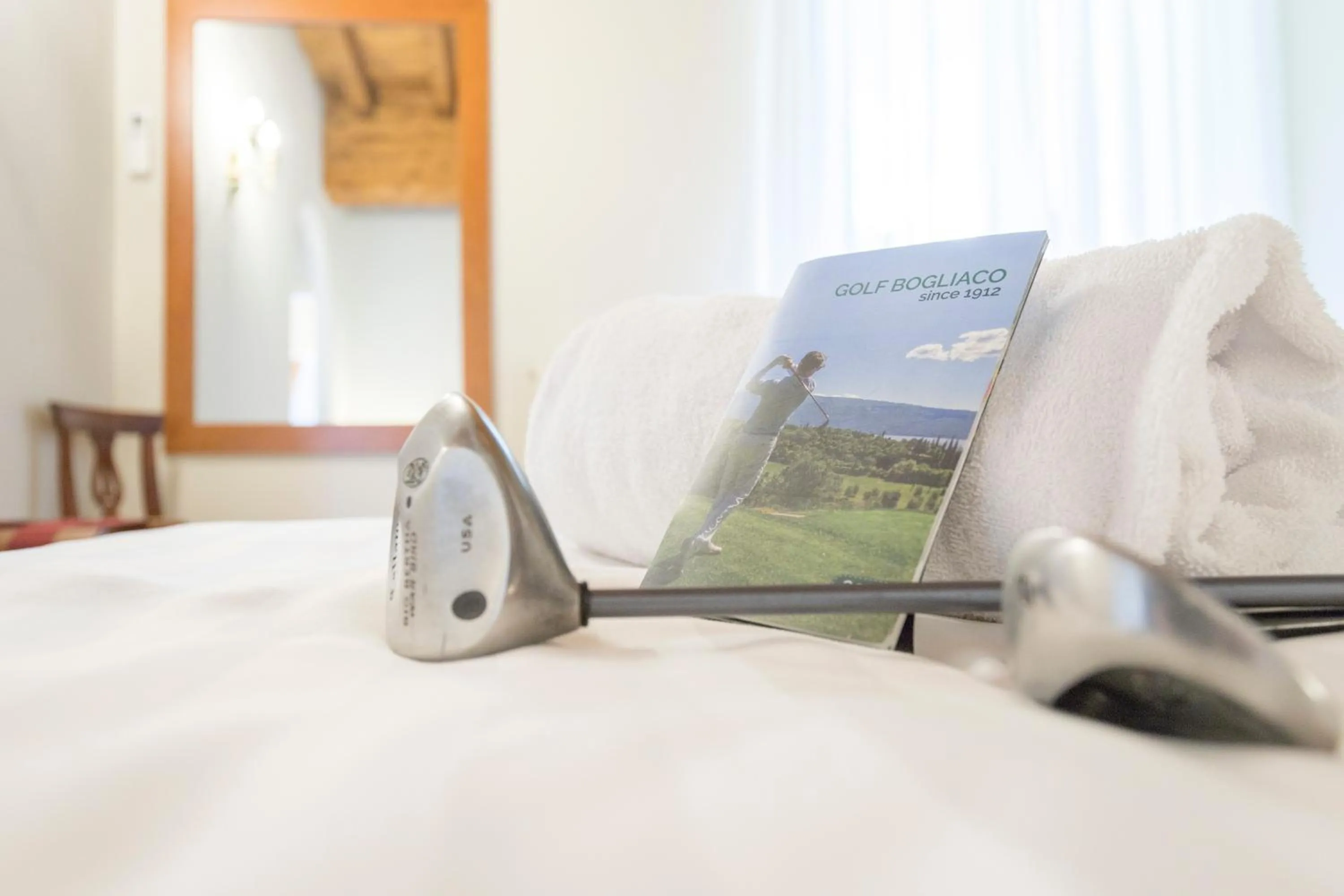 Bed in Apartments Golf Bogliaco