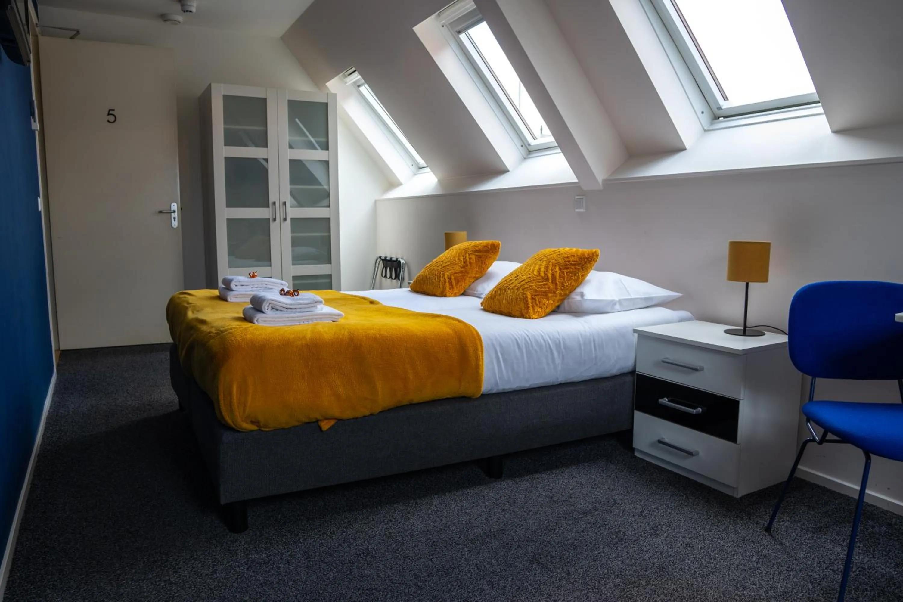 Bed in OTTO Boutique Hotel