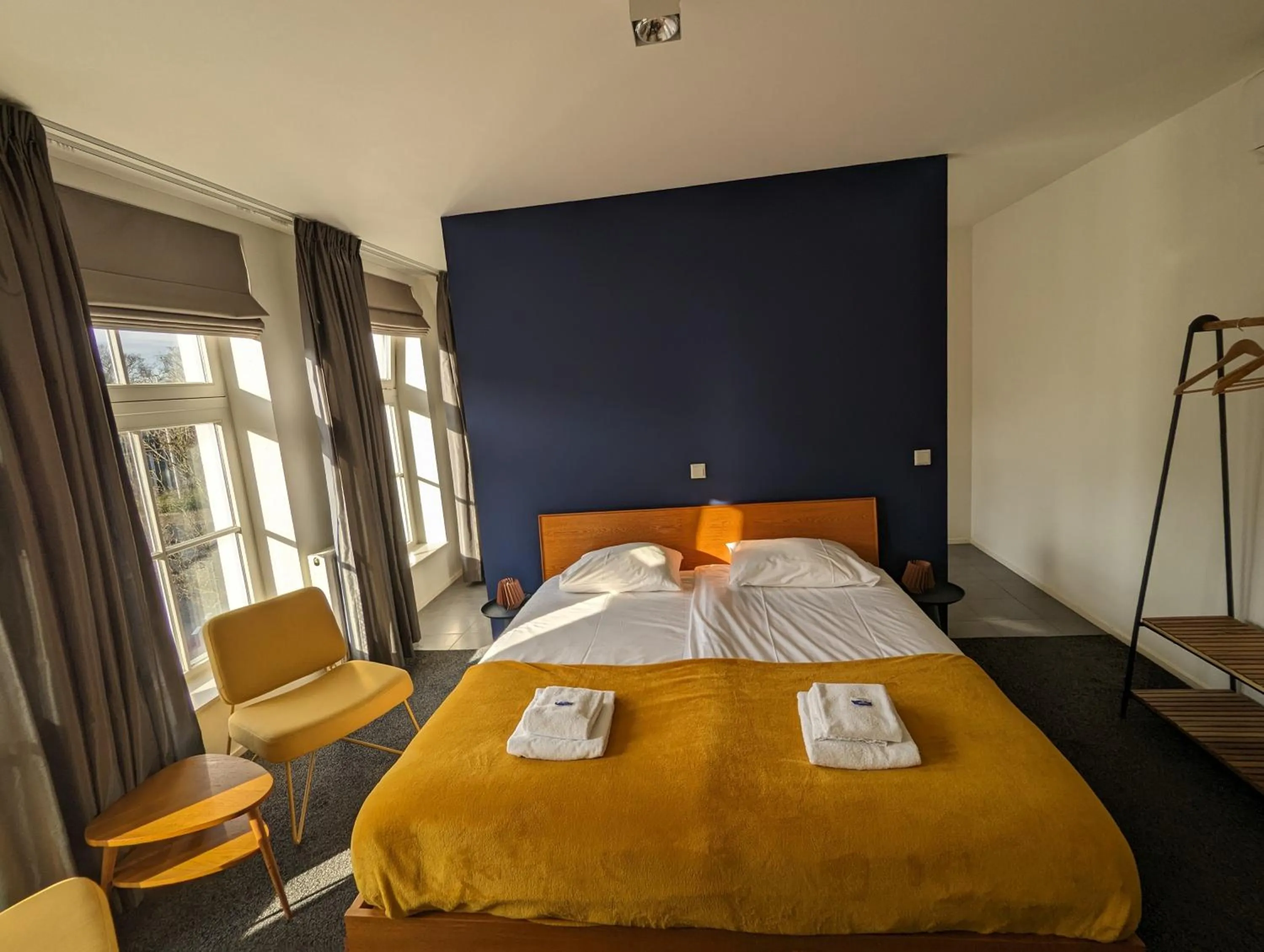 Bed in OTTO Boutique Hotel