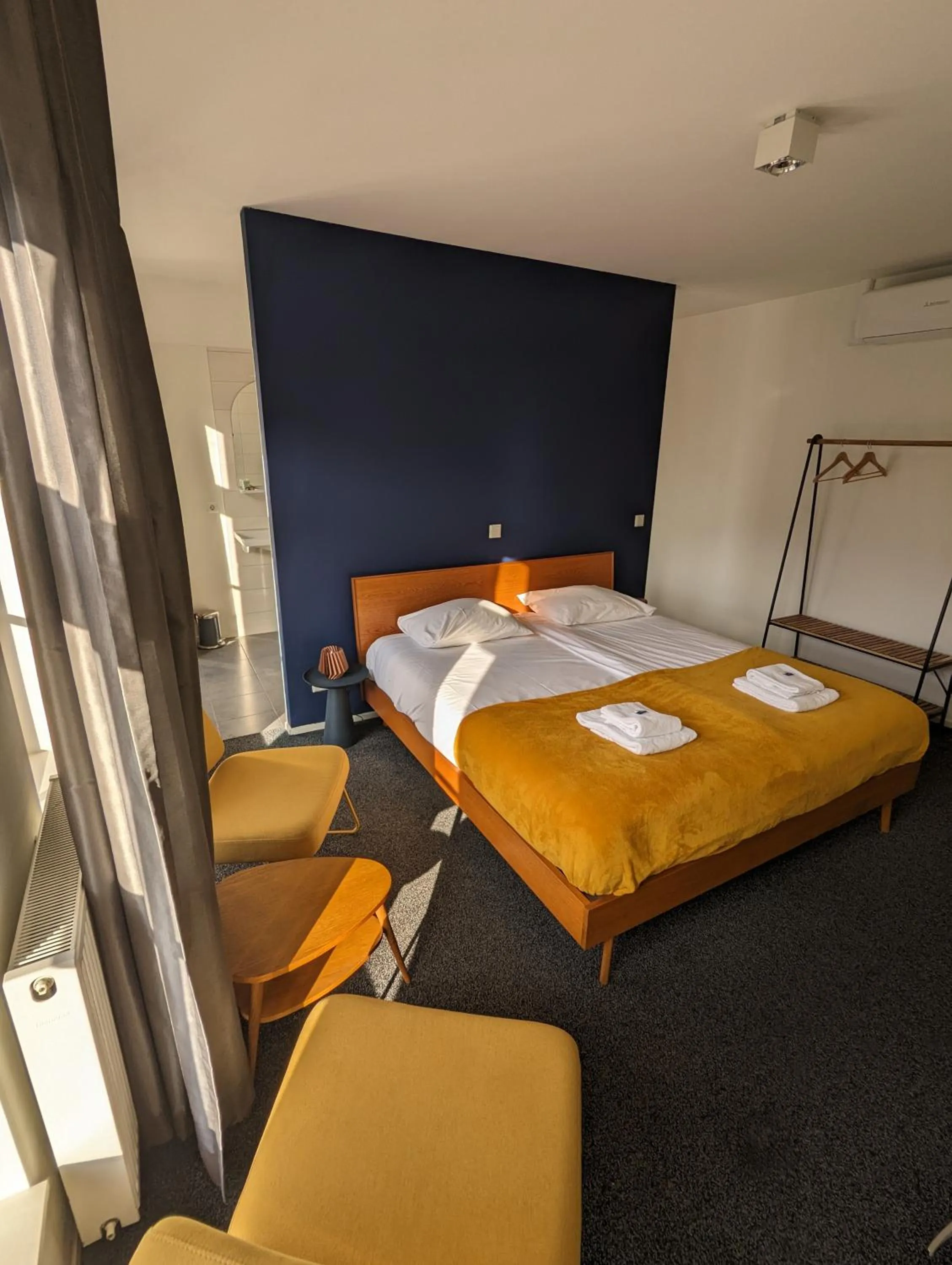 Bed in OTTO Boutique Hotel