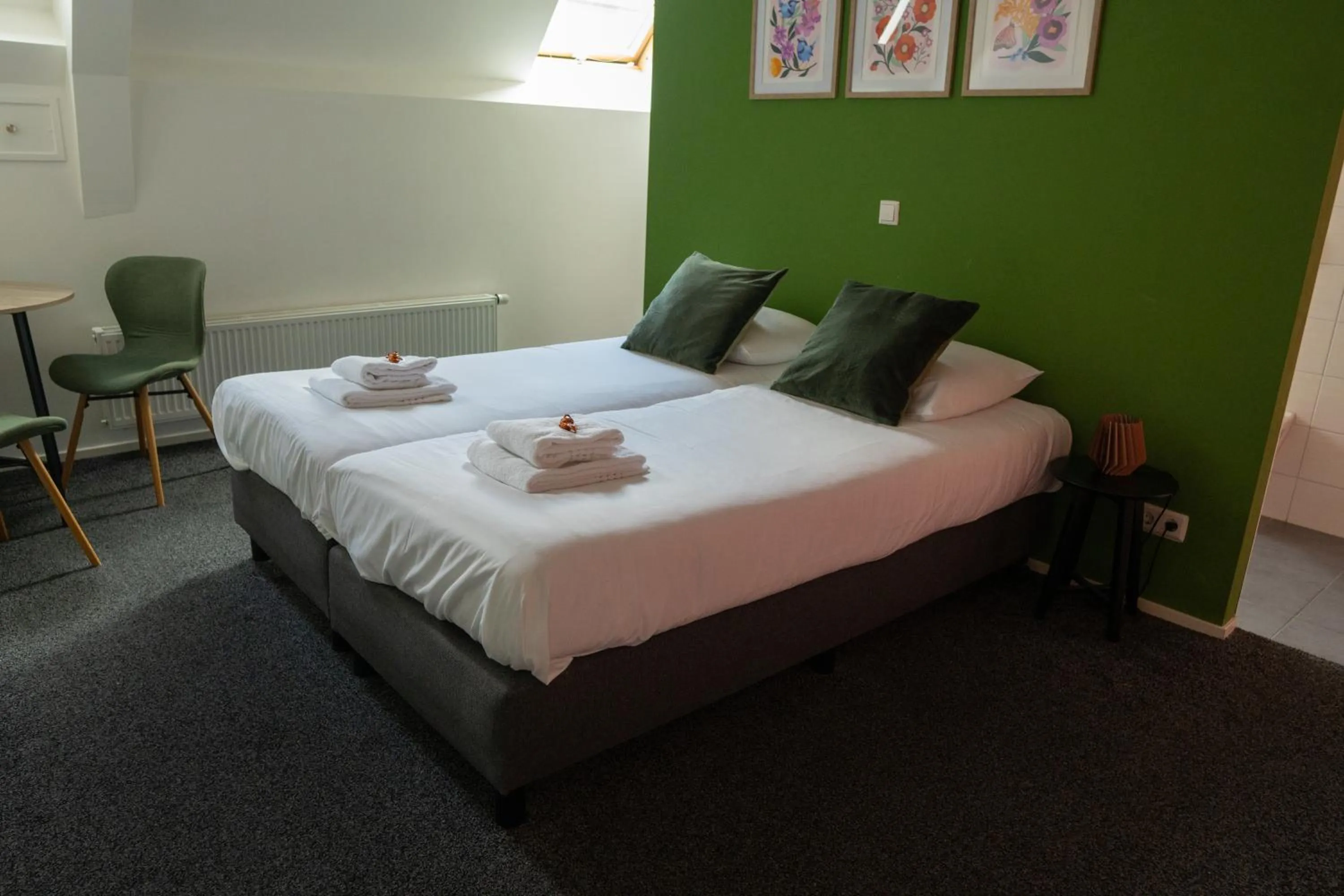 Bed in OTTO Boutique Hotel