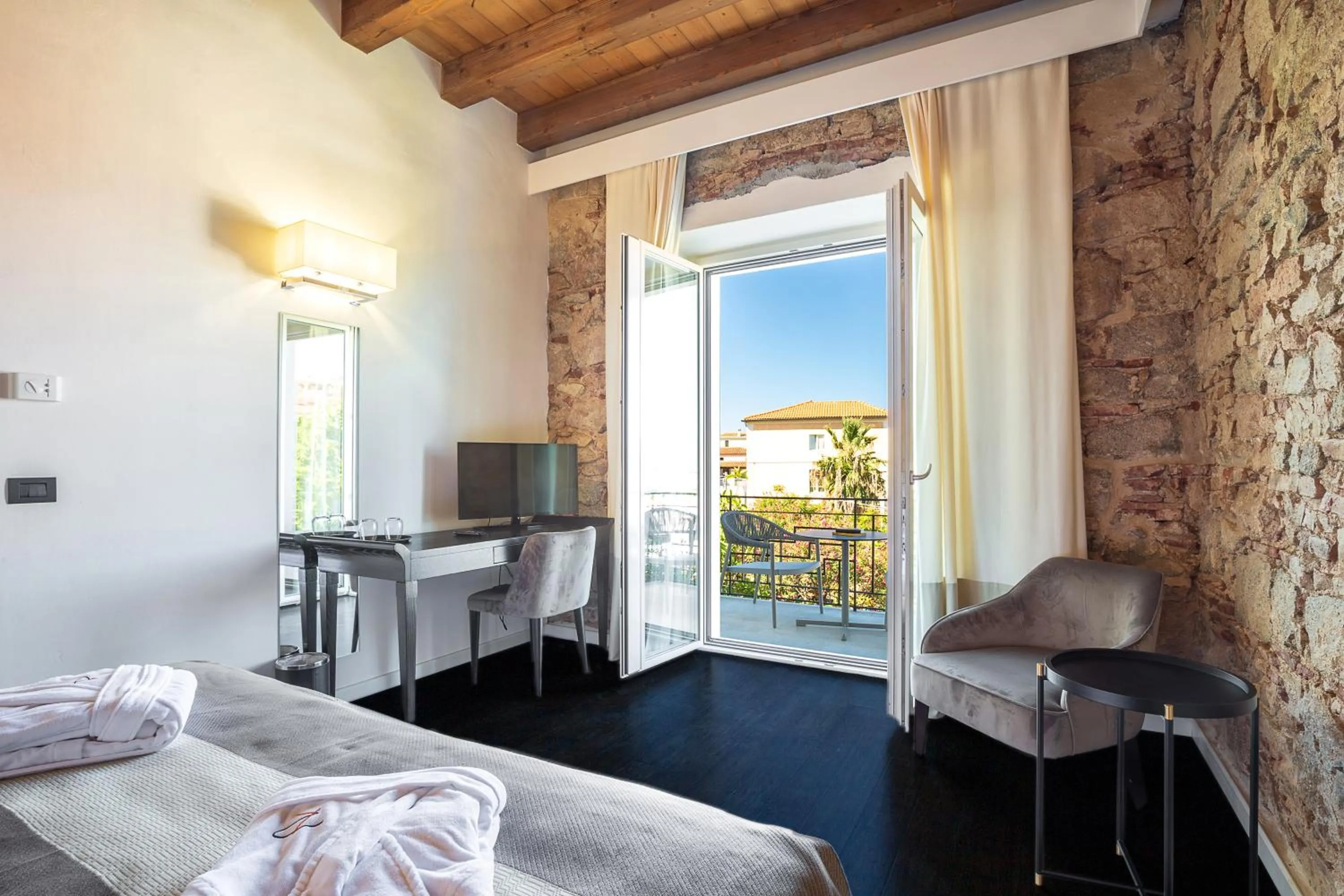 Garden view, Bed in Raphael Hotel Arbatax