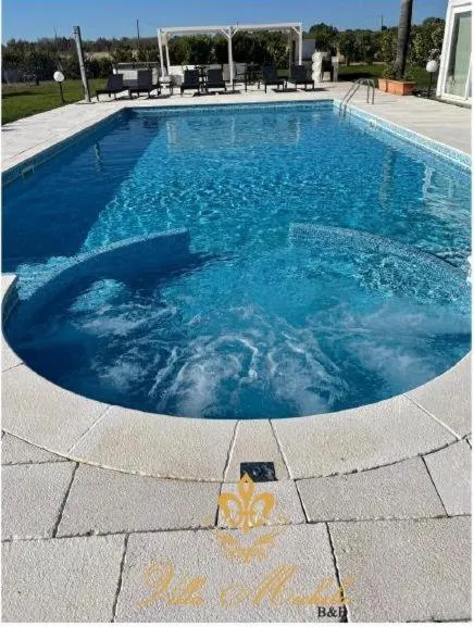 Swimming pool in Bed & Breakfast Villa Michela Alezio