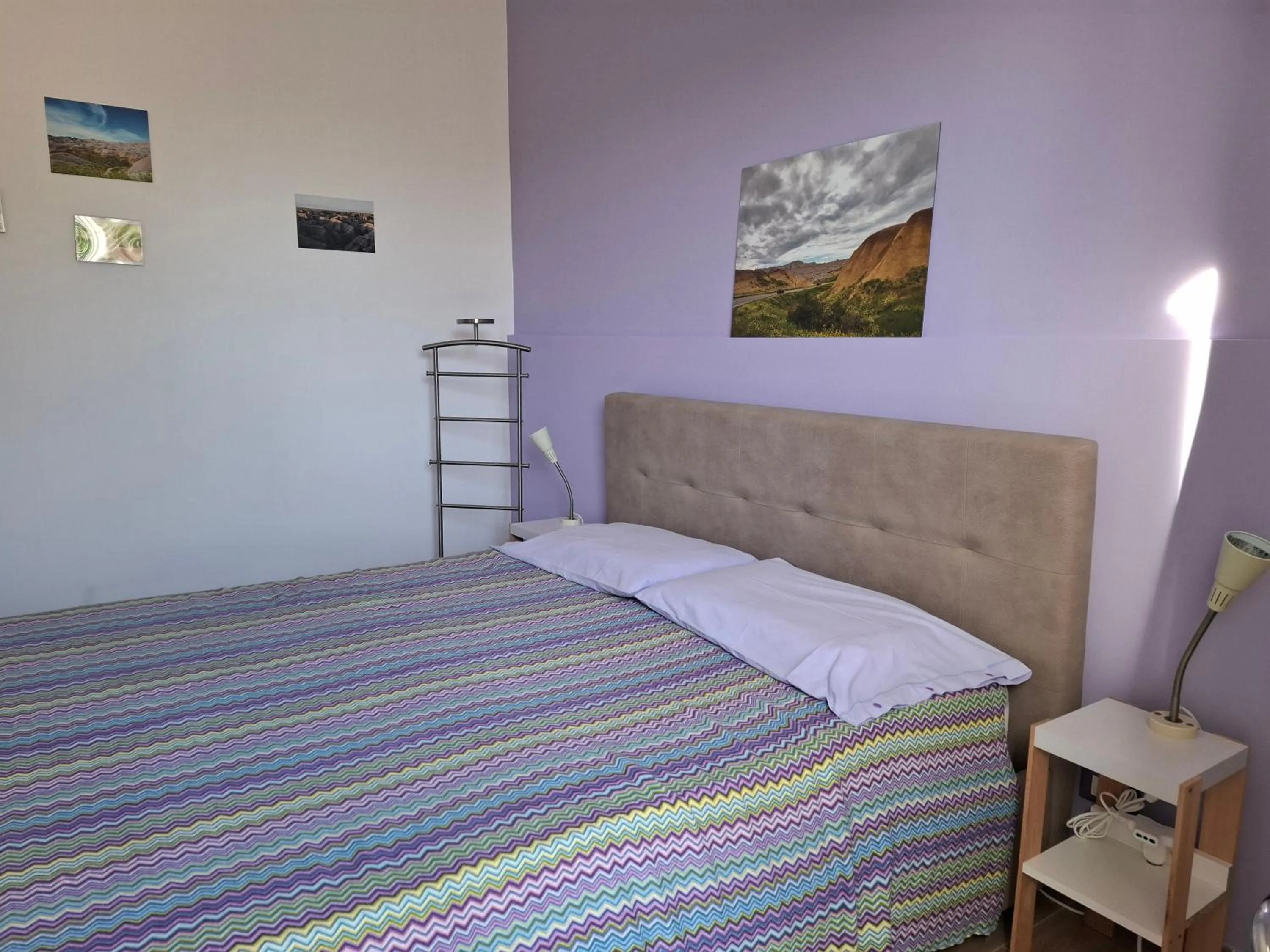 Bed in Turtle Island Apartments