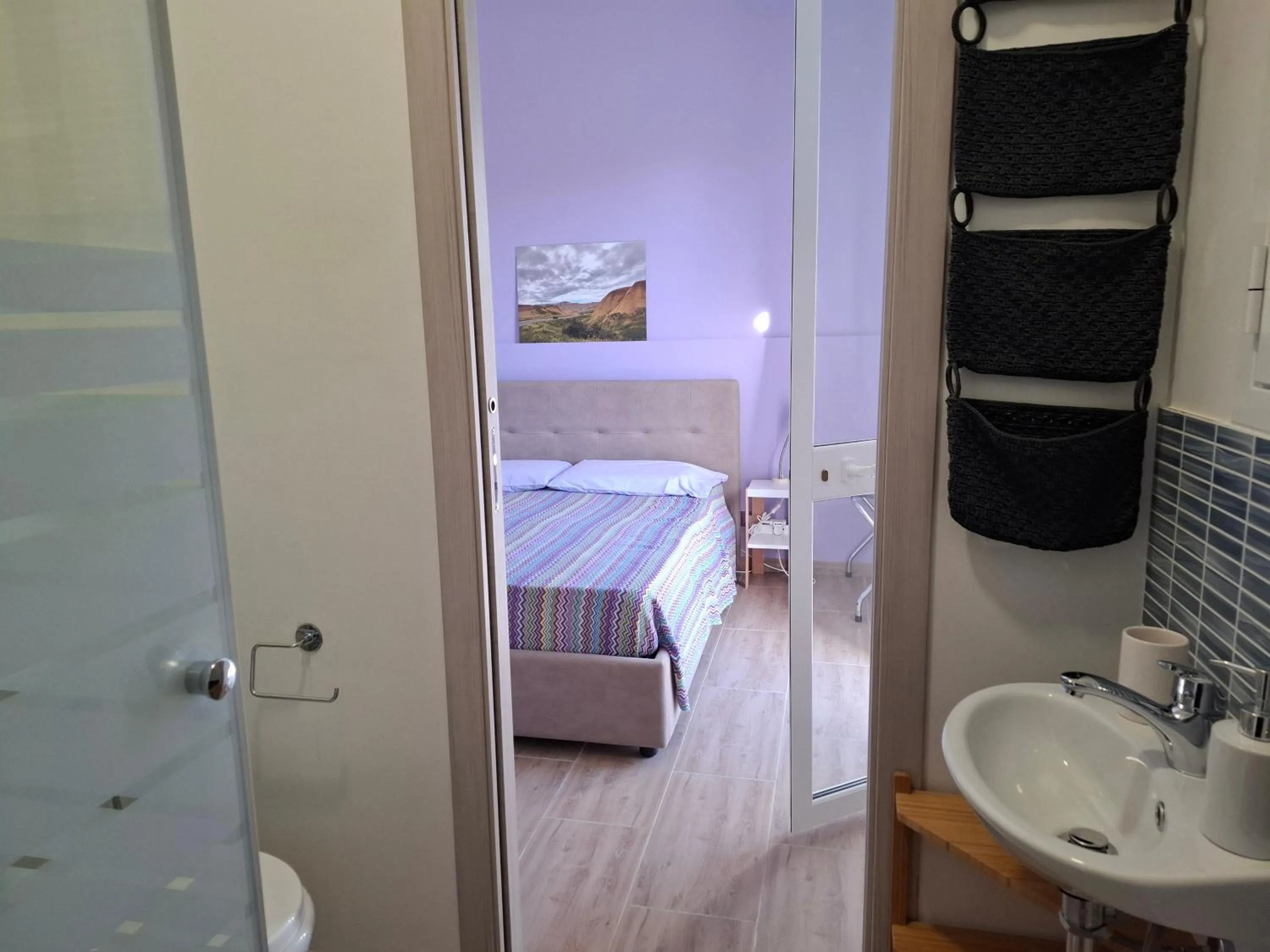 Bed in Turtle Island Apartments