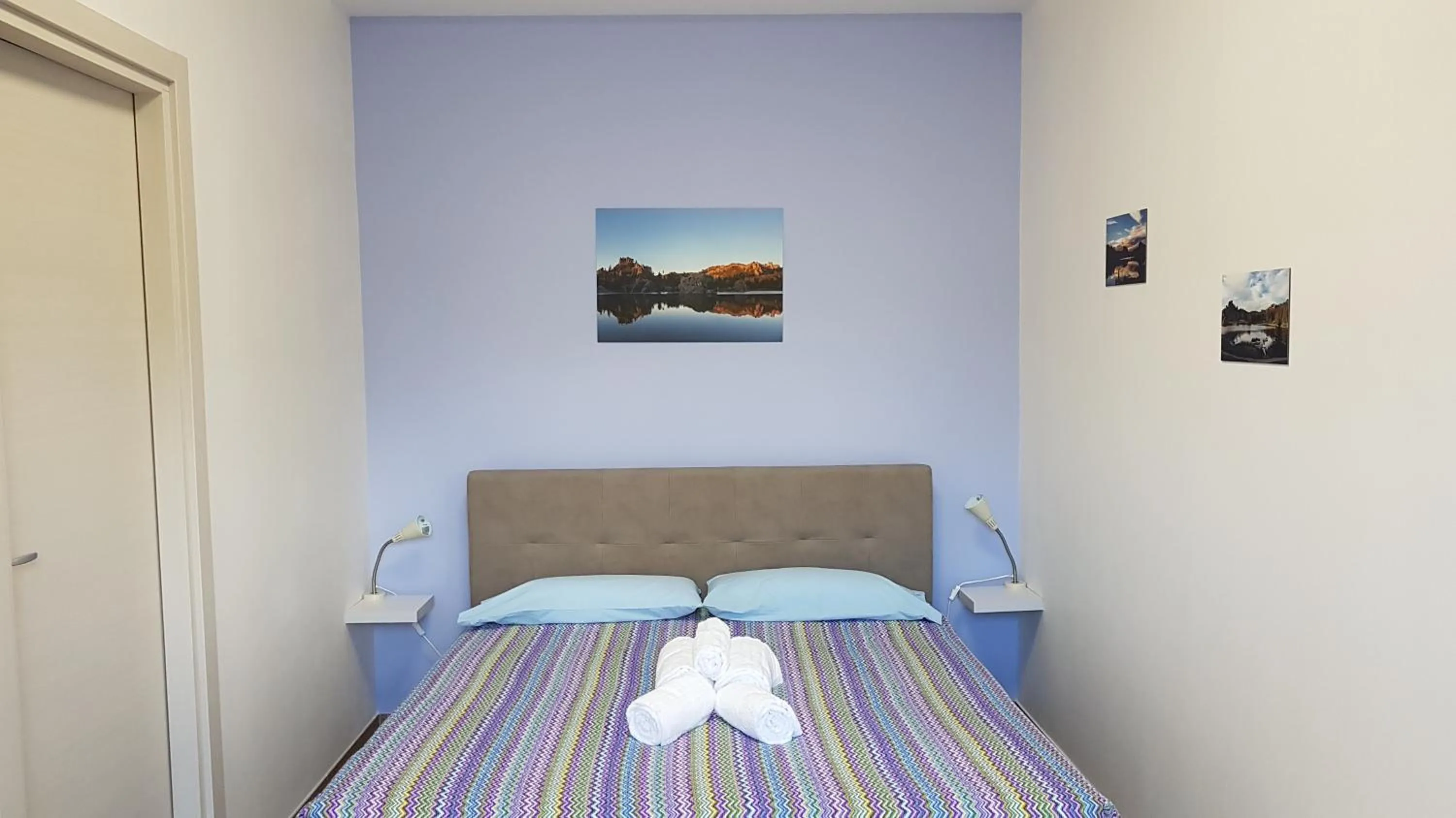 Bed in Turtle Island Apartments
