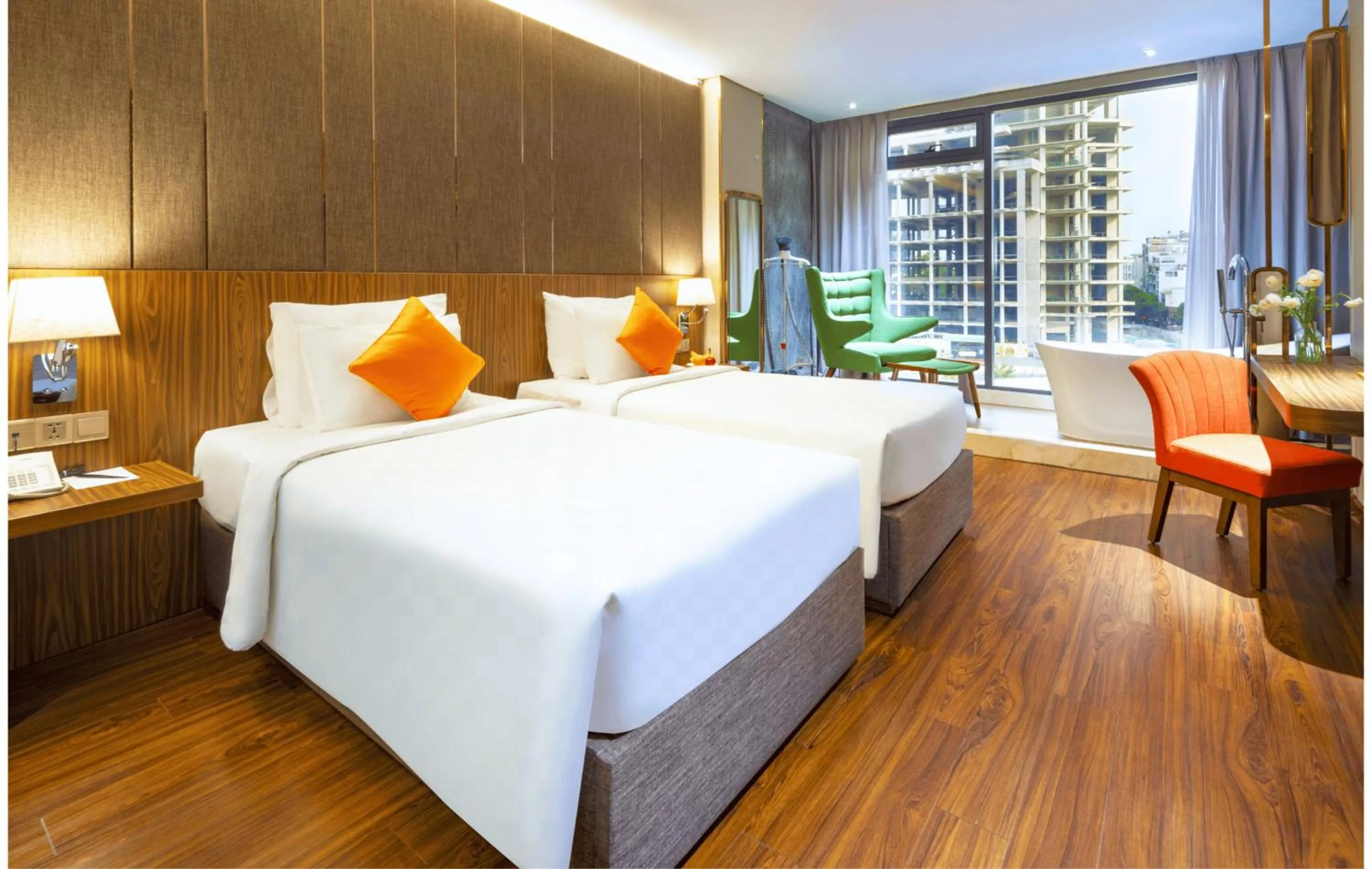 Bed in Winsuites Saigon Hotel