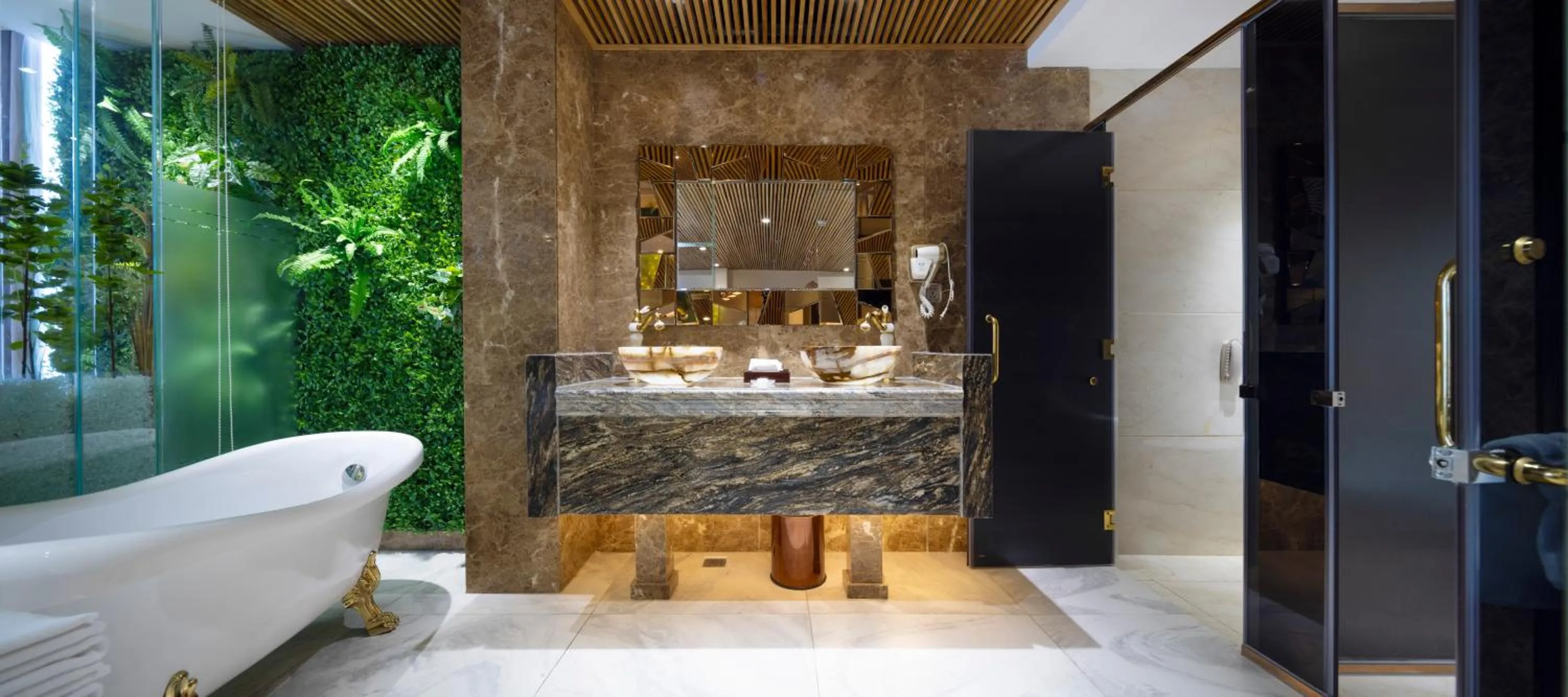 Bathroom in Winsuites Saigon Hotel