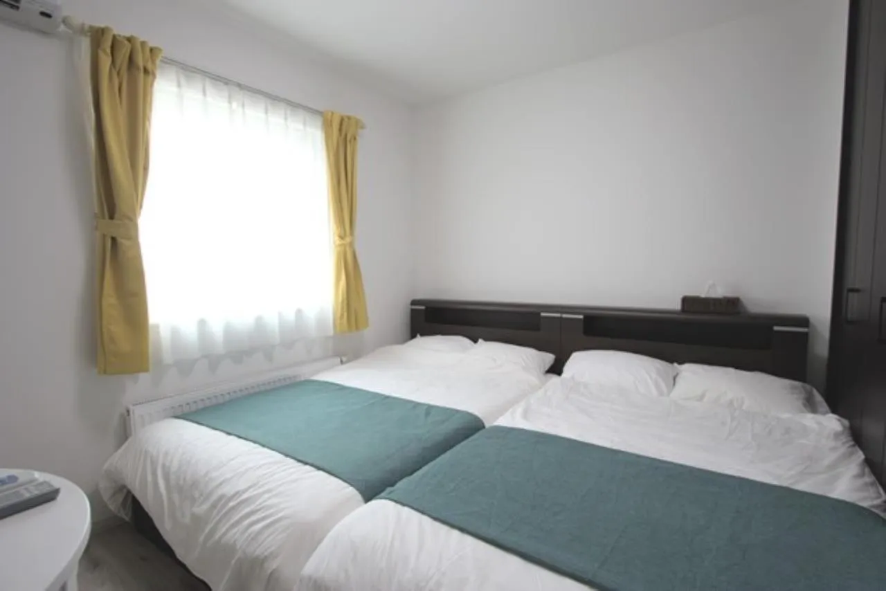 Bed in TEINE WHITE HOUSE