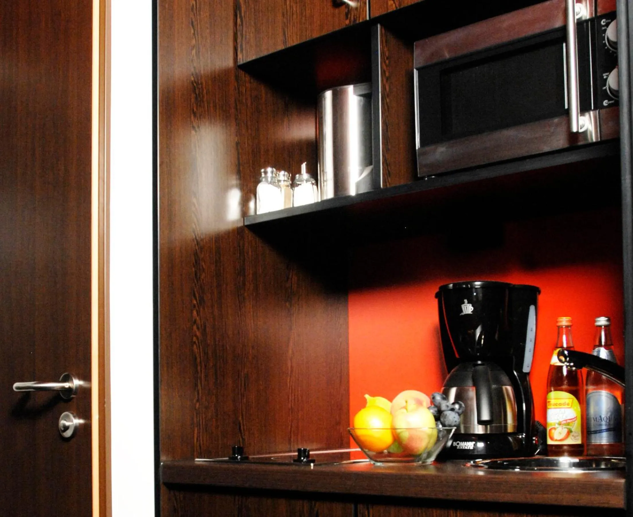 Kitchen or kitchenette in Stay2Munich Hotel & Serviced Apartments