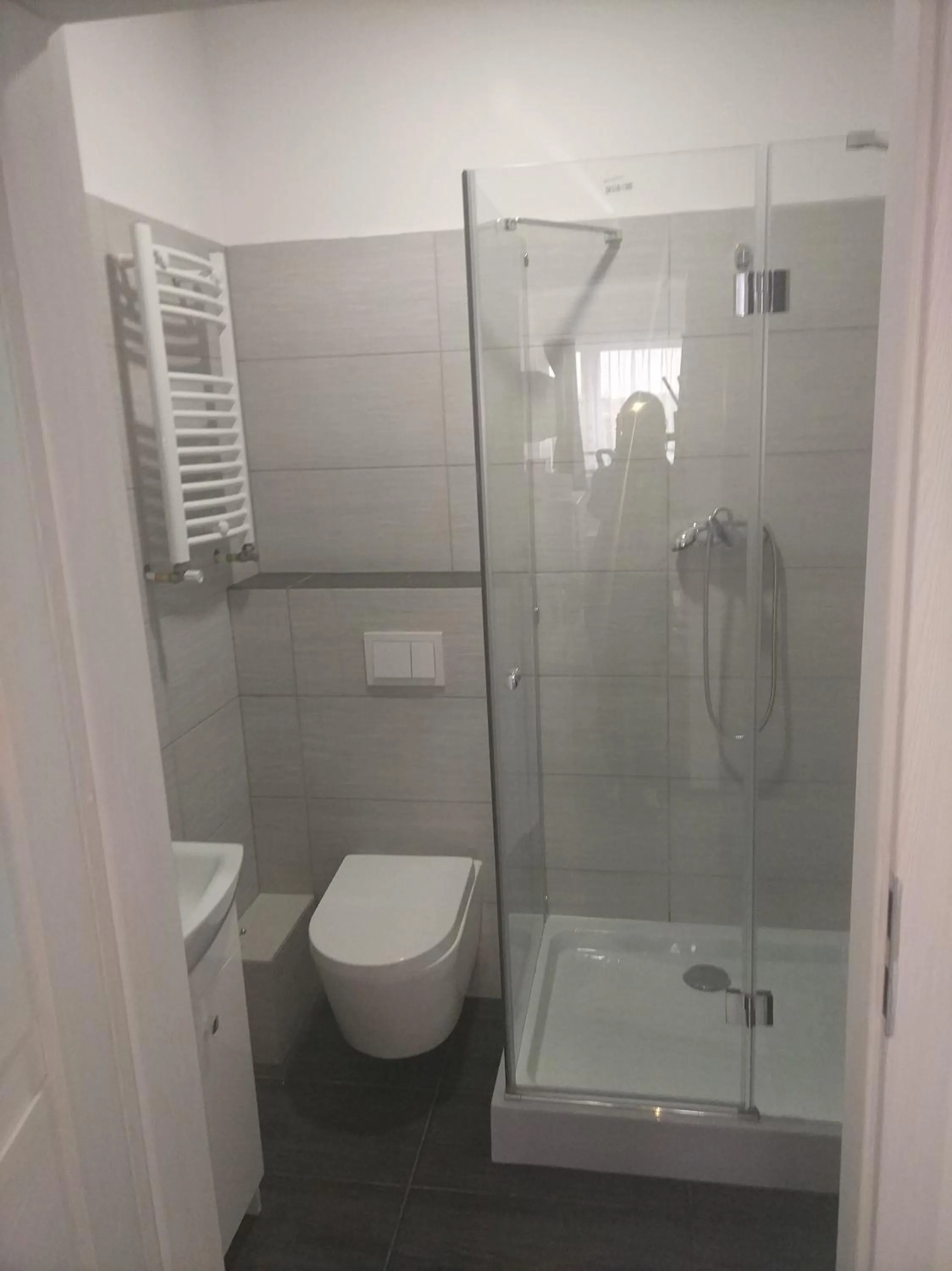 Shower in VESTA Apartamenty P23