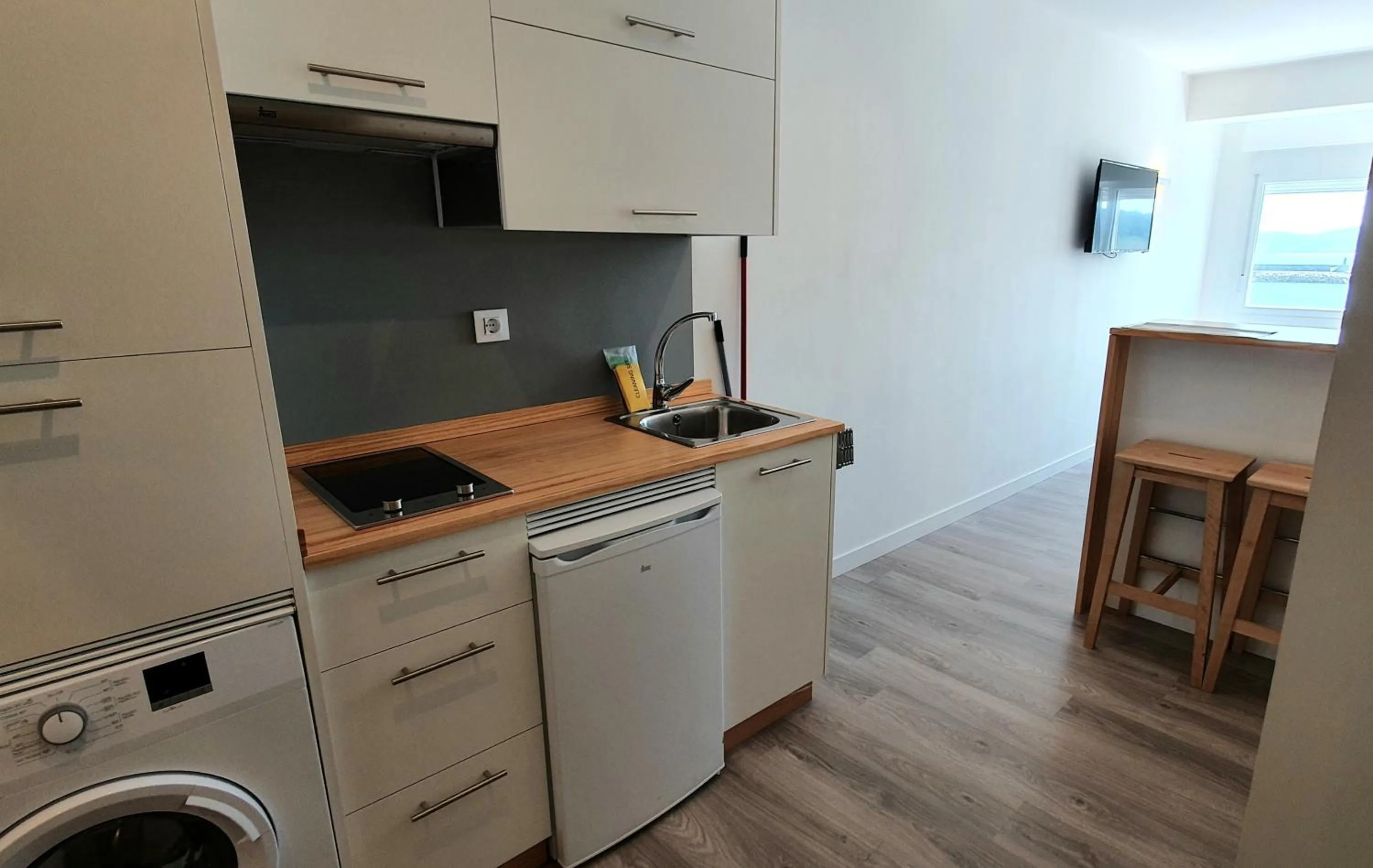 Kitchen or kitchenette in Apartamentos Costa da Morte Muxia