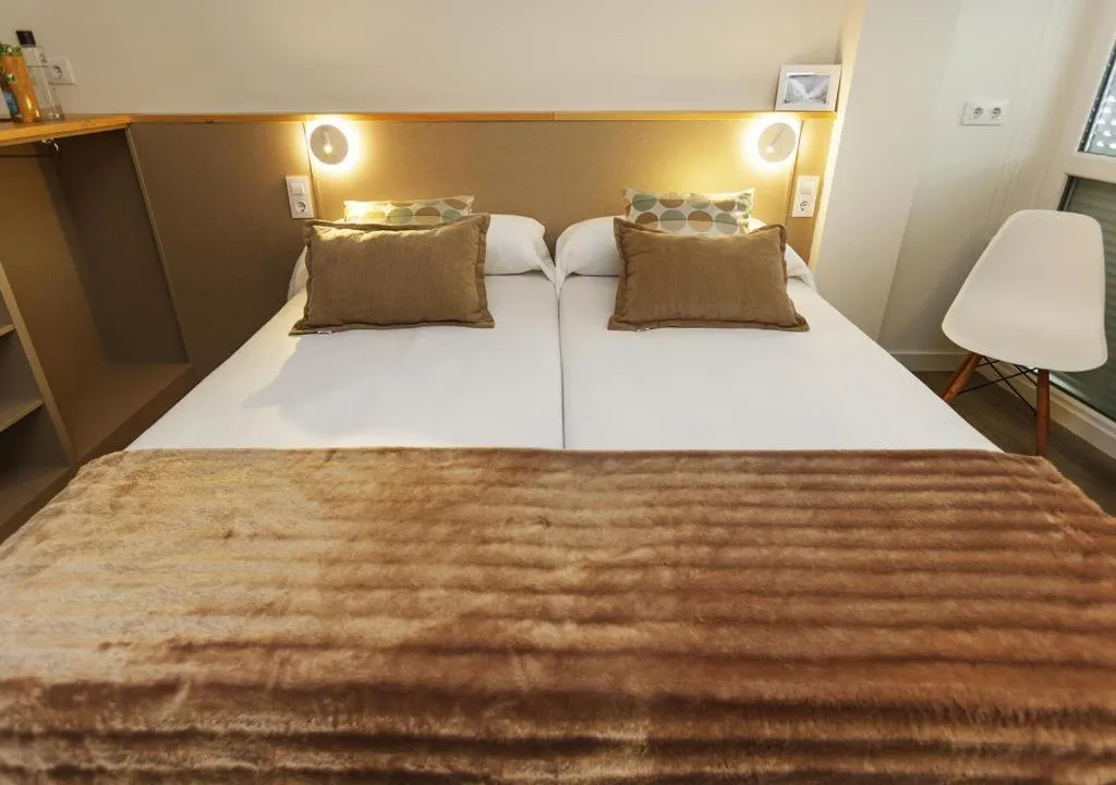 Bed in Apartamentos Costa da Morte Muxia