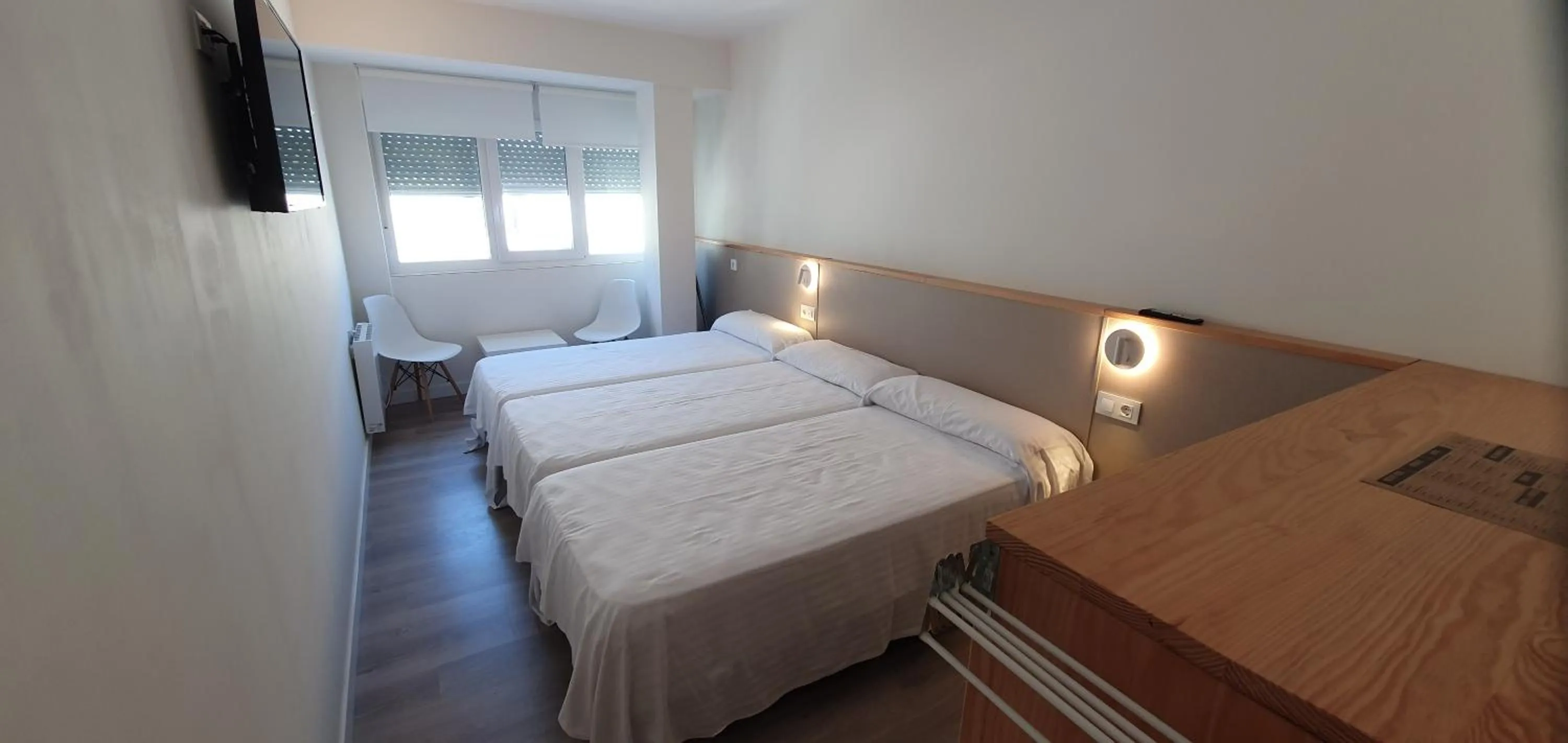 Bed in Apartamentos Costa da Morte Muxia