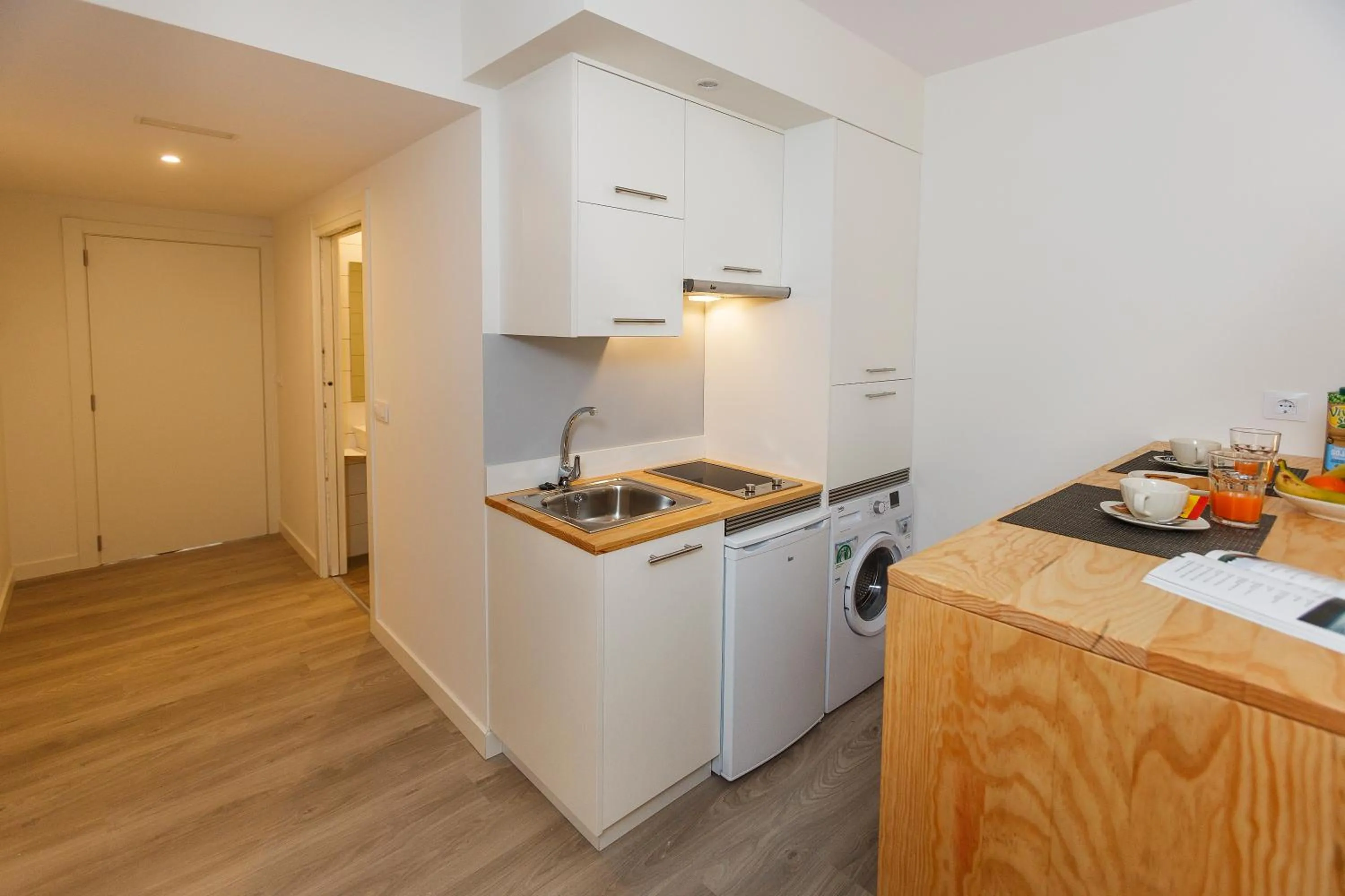 Kitchen or kitchenette in Apartamentos Costa da Morte Muxia