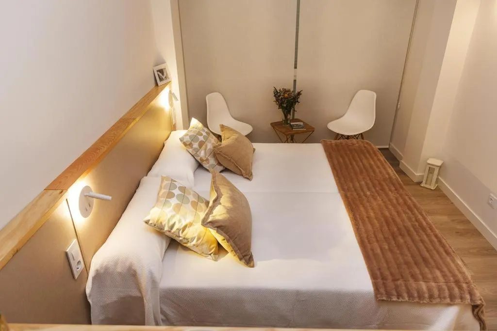 Bed in Apartamentos Costa da Morte Muxia