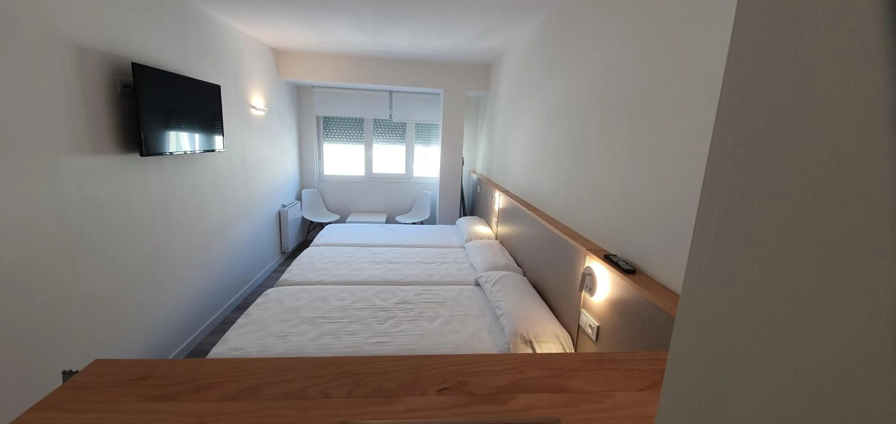 Bed in Apartamentos Costa da Morte Muxia