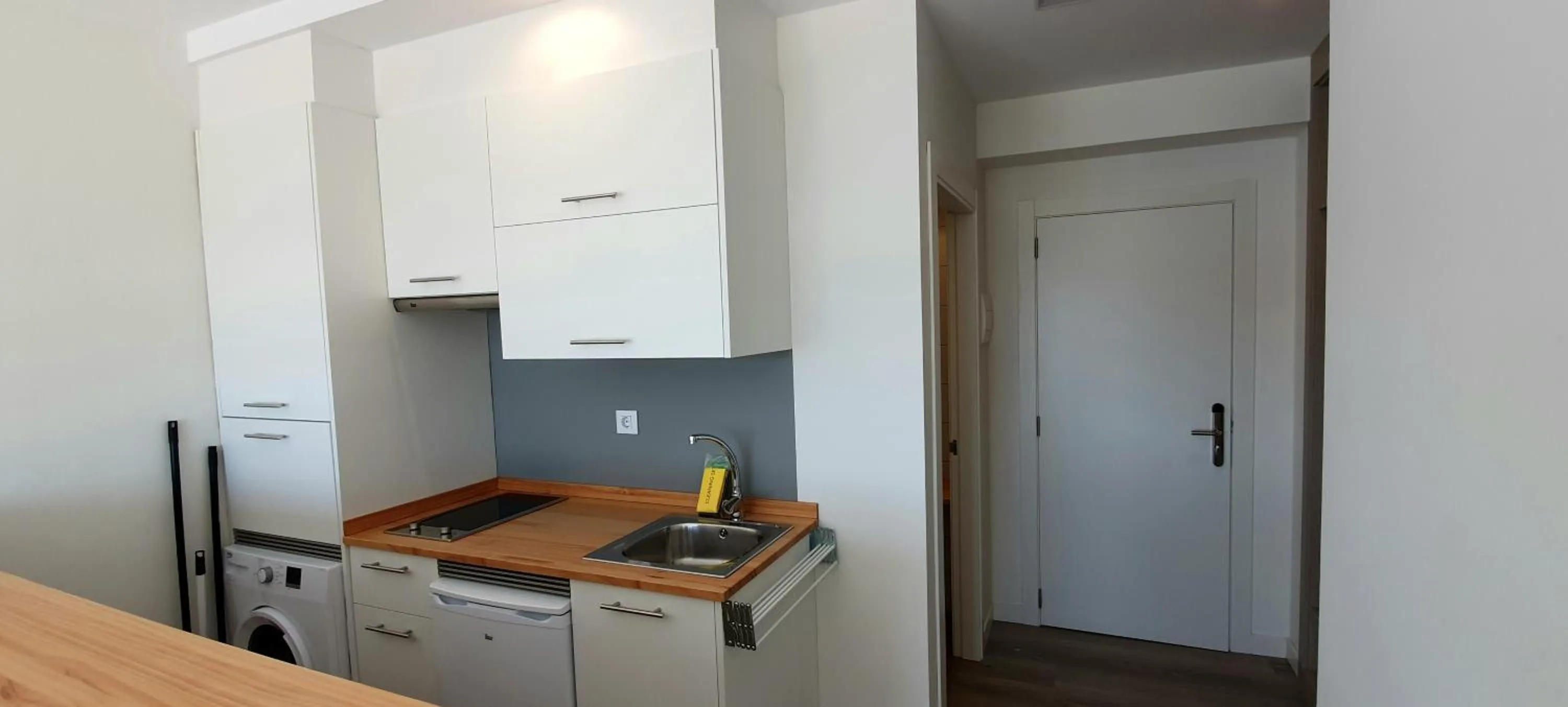 Kitchen or kitchenette in Apartamentos Costa da Morte Muxia